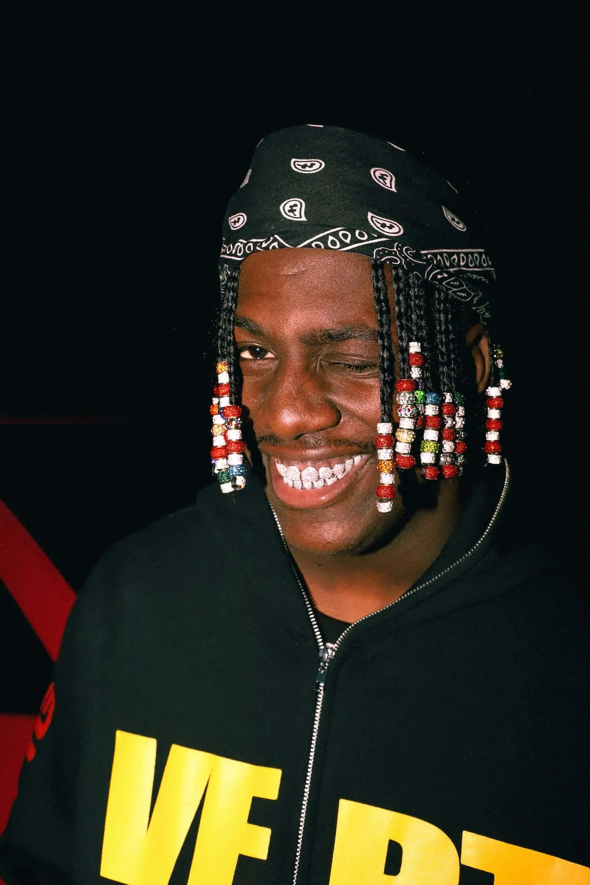 Download Rapper Lil Yachty Exudes Charisma and Star Power Wallpaper