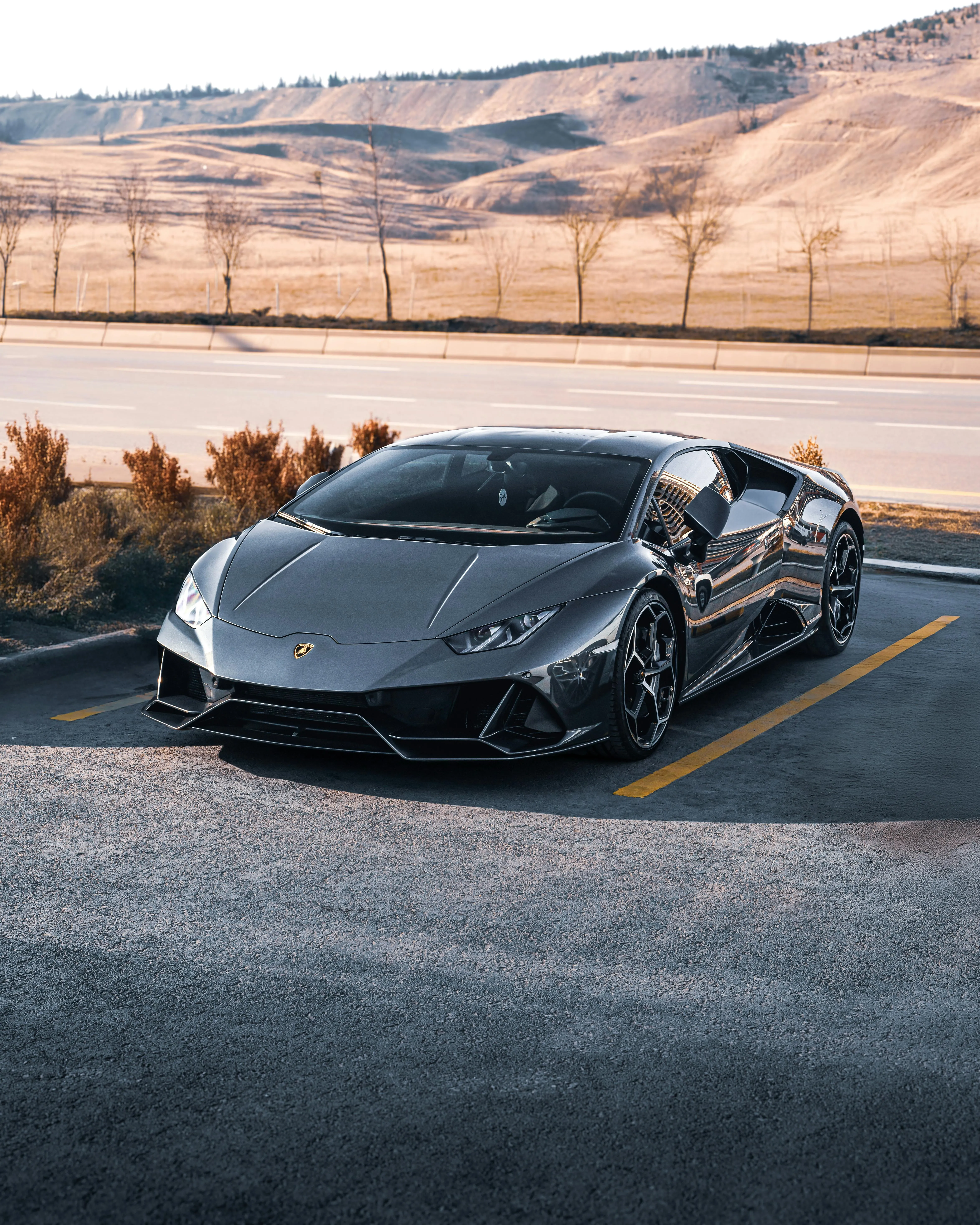 Sleek Lamborghini Huracan in Scenic Landscape · Free