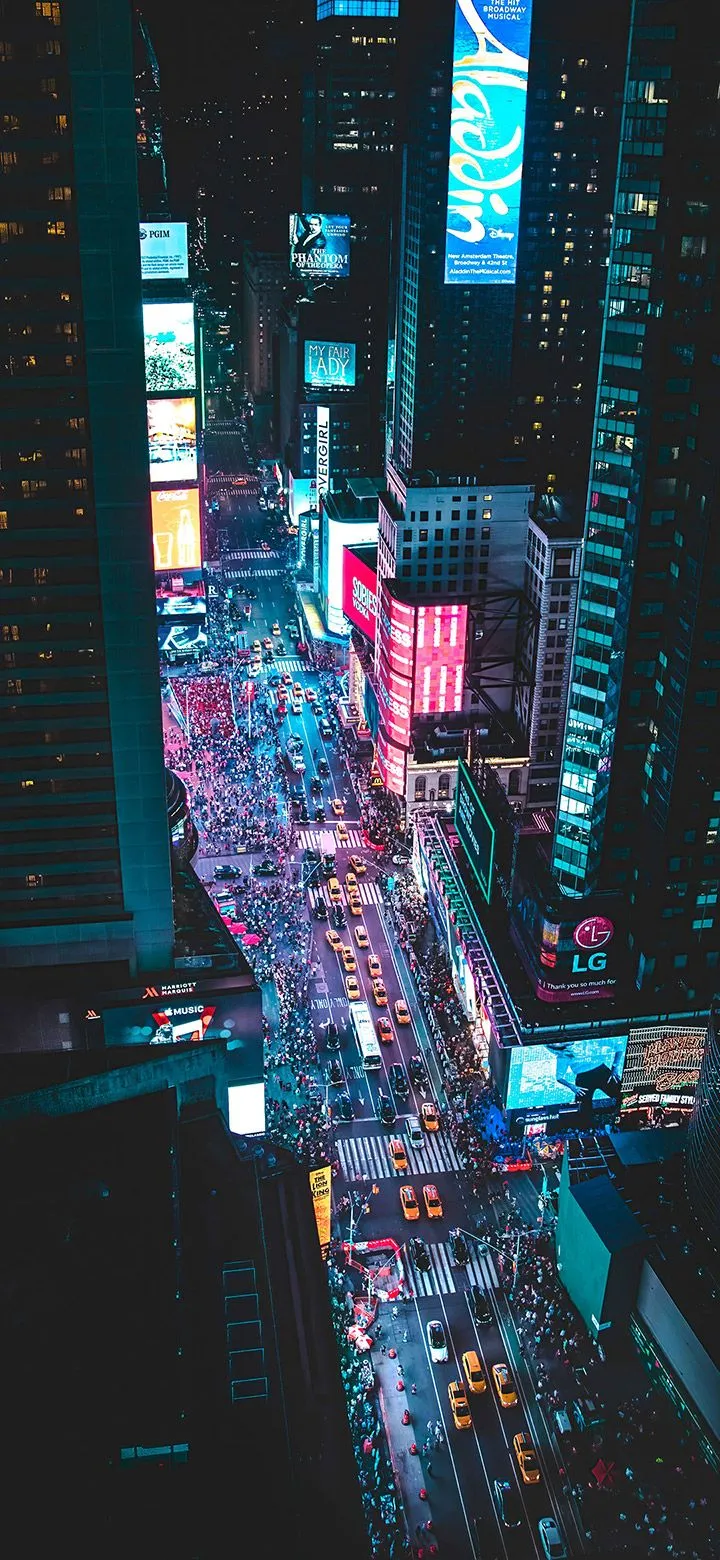Busy City During Dark Nights 4K Phone Wallpaper
