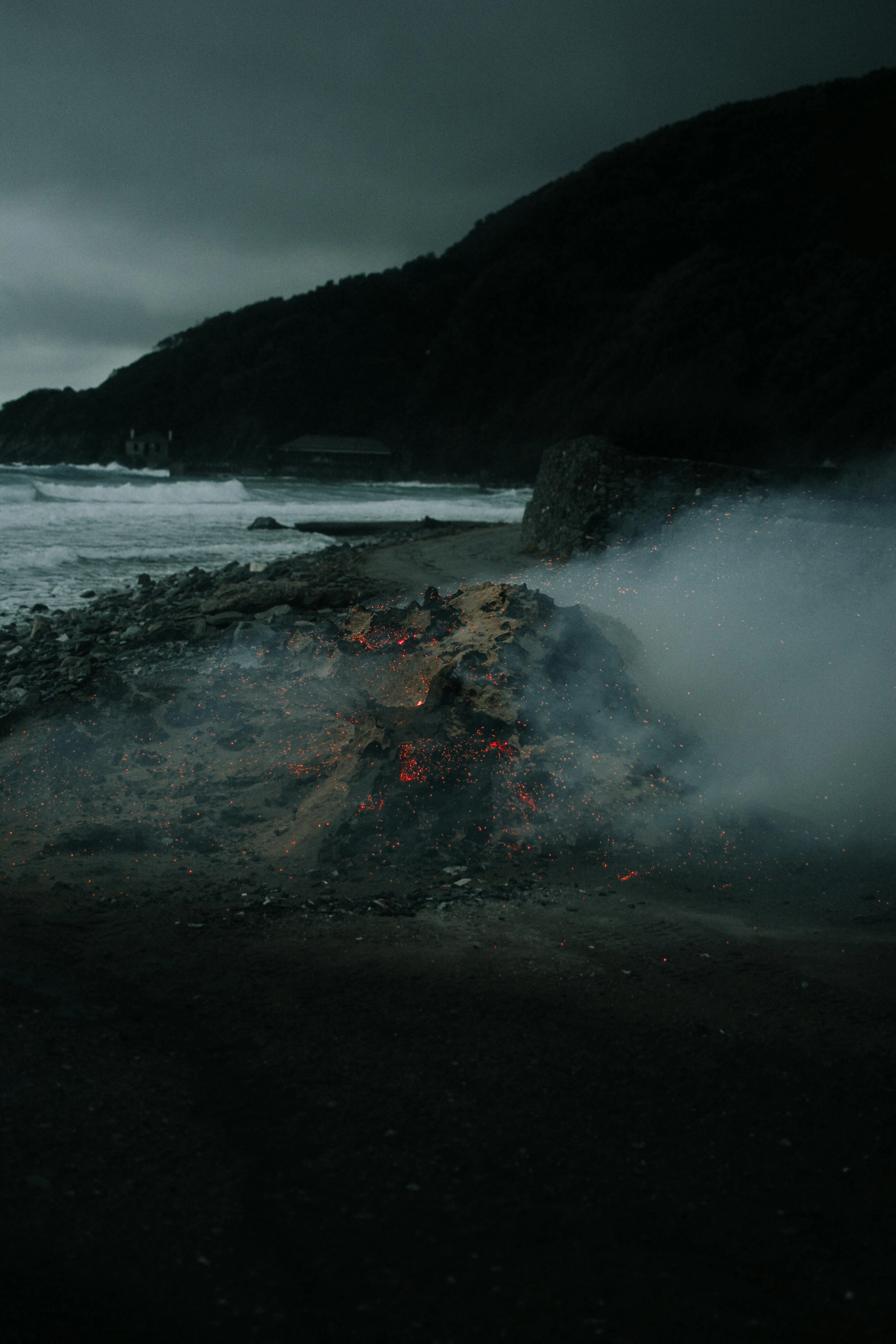 A beach with smoke coming out of it · Free