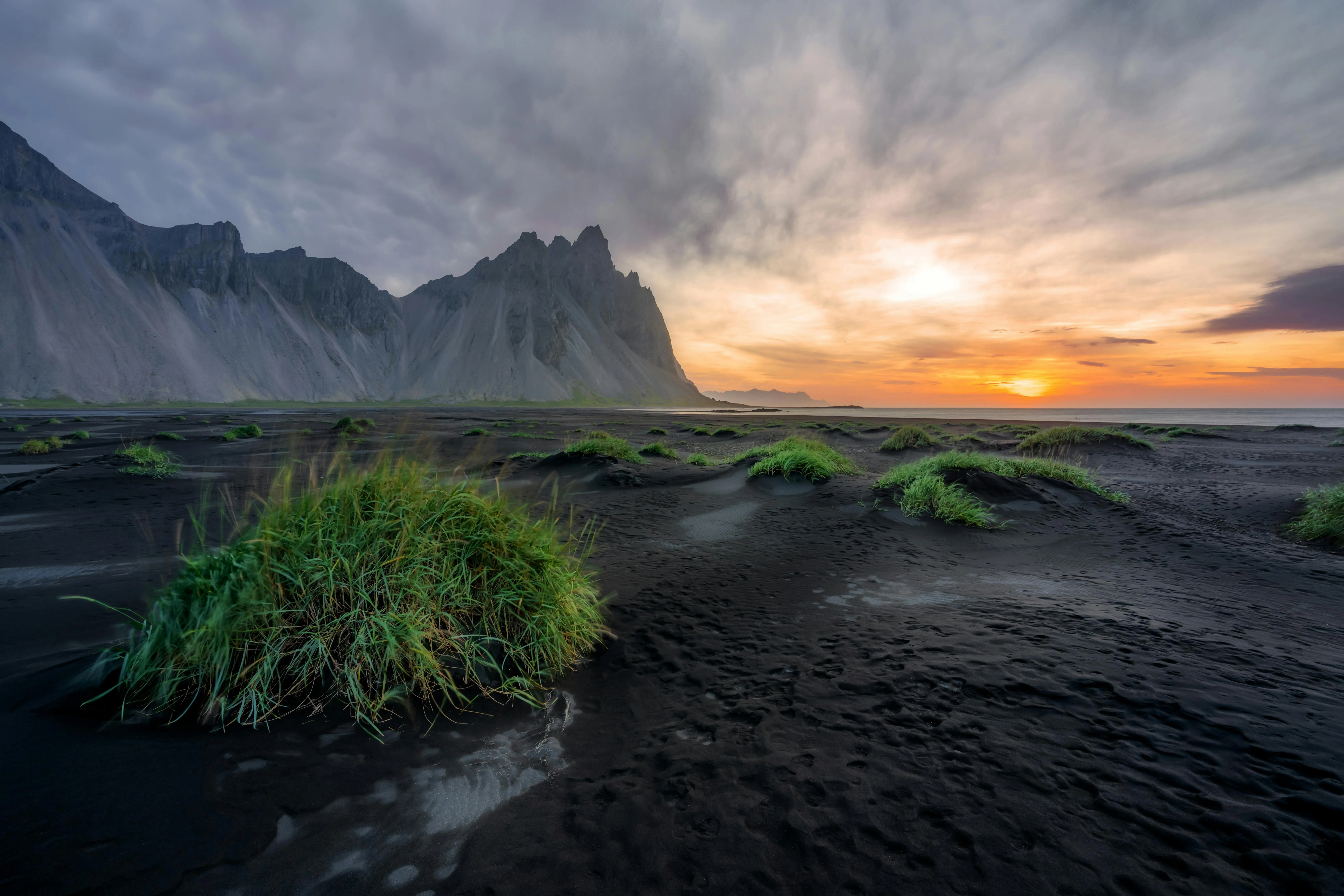 View of a Black Sand Beach and Vestrahorn in the Horizon, Iceland · Free