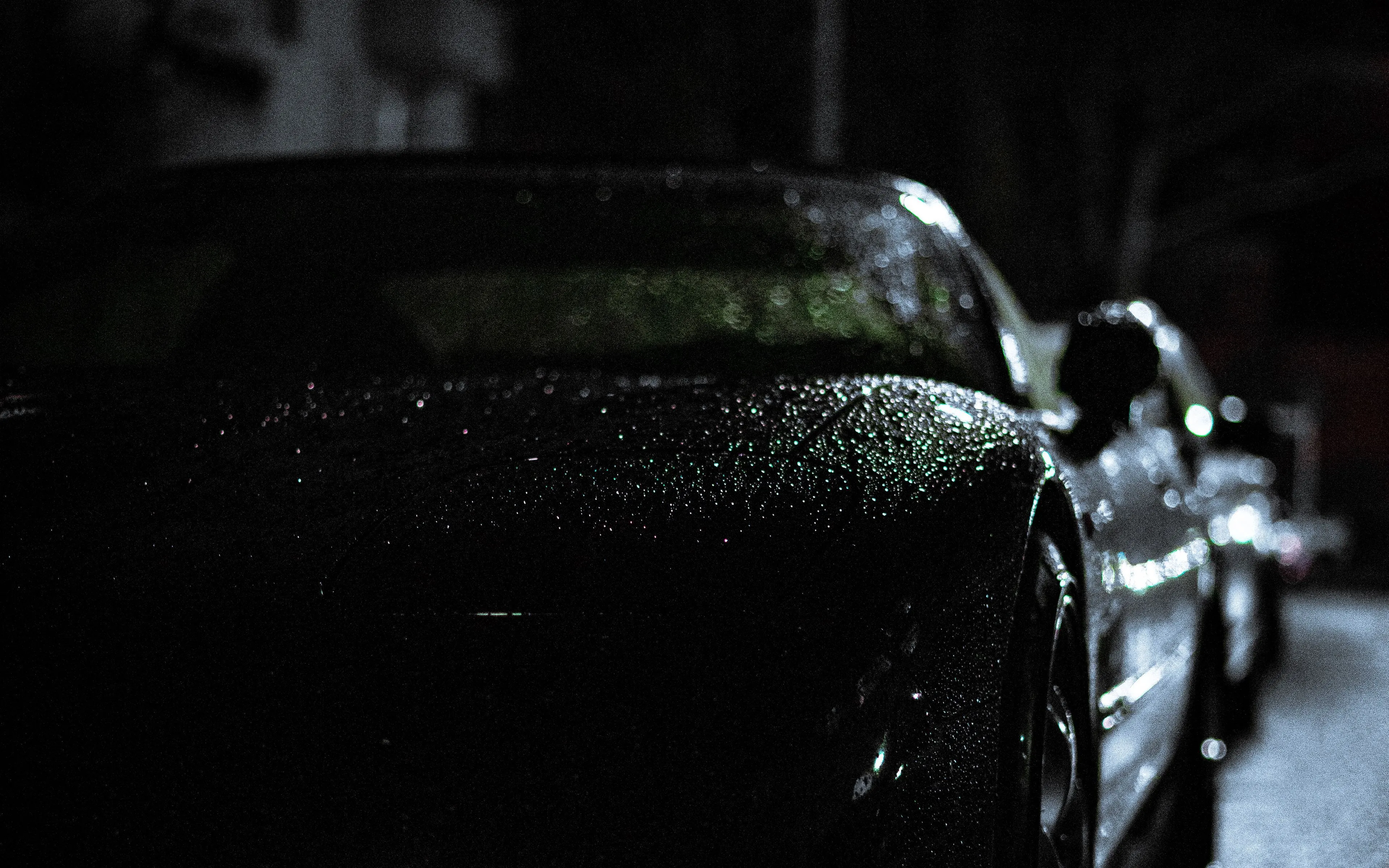 Download wallpaper 3840x2400 headlight, car, rain, darkness, front view 4k ultra HD 16:10 HD background