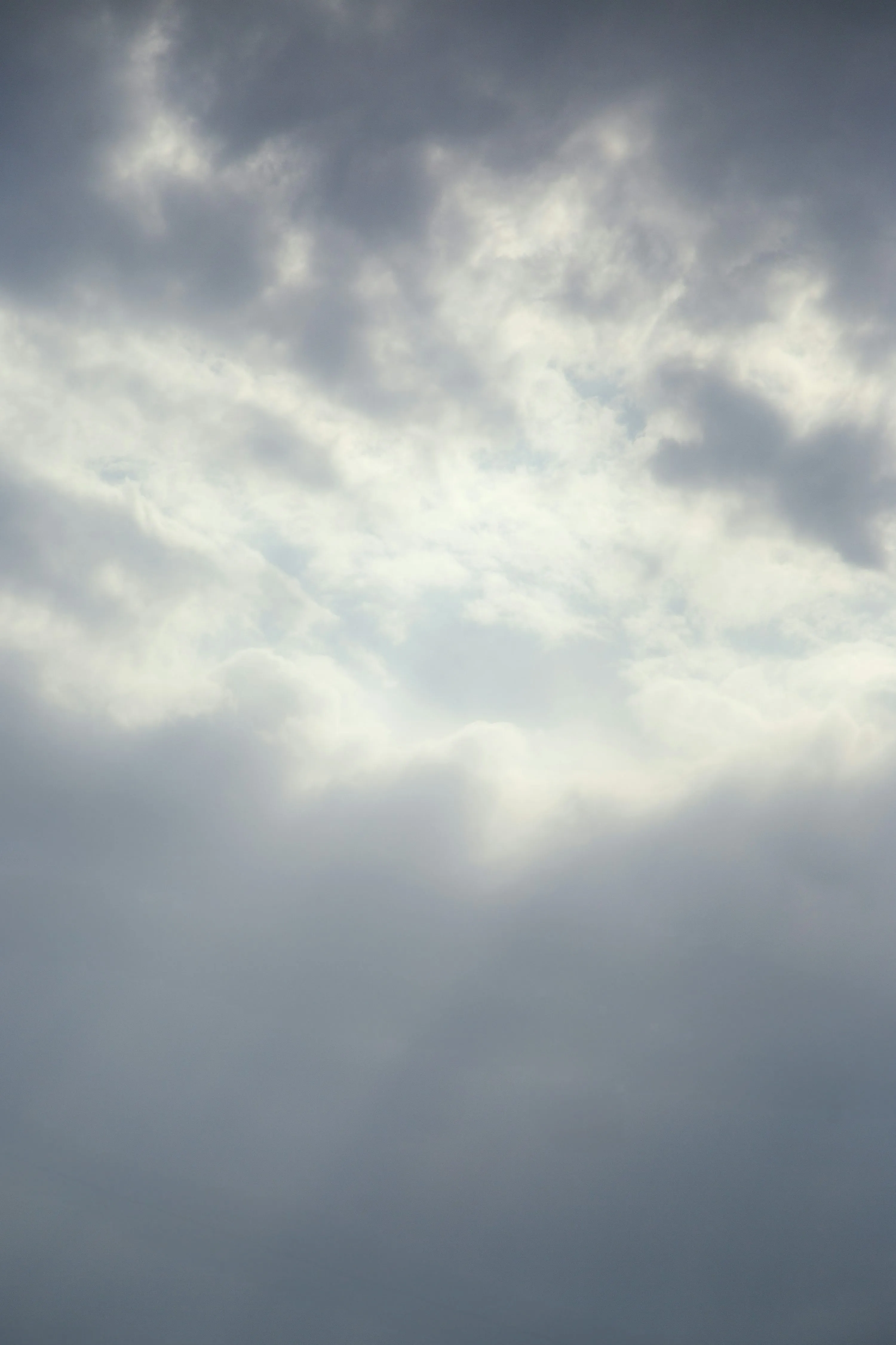 Cloudy sky with a hint of sunlight. photo