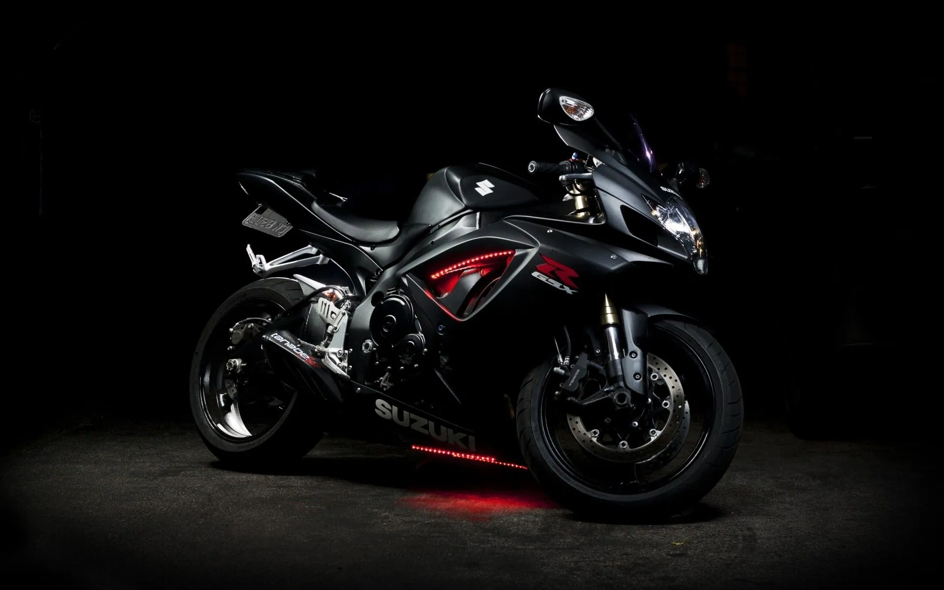 Modern motorcycle on a black background