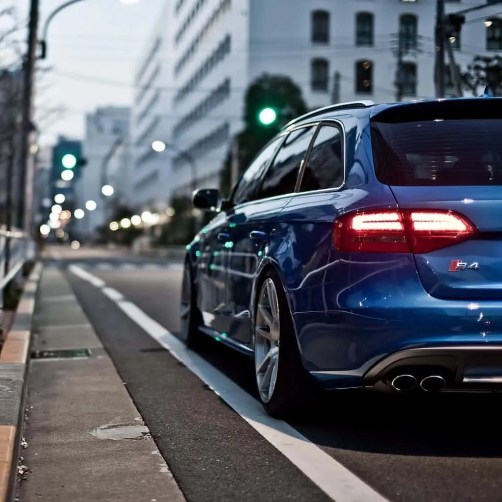 Download Sleek Audi S4 in Motion Wallpaper