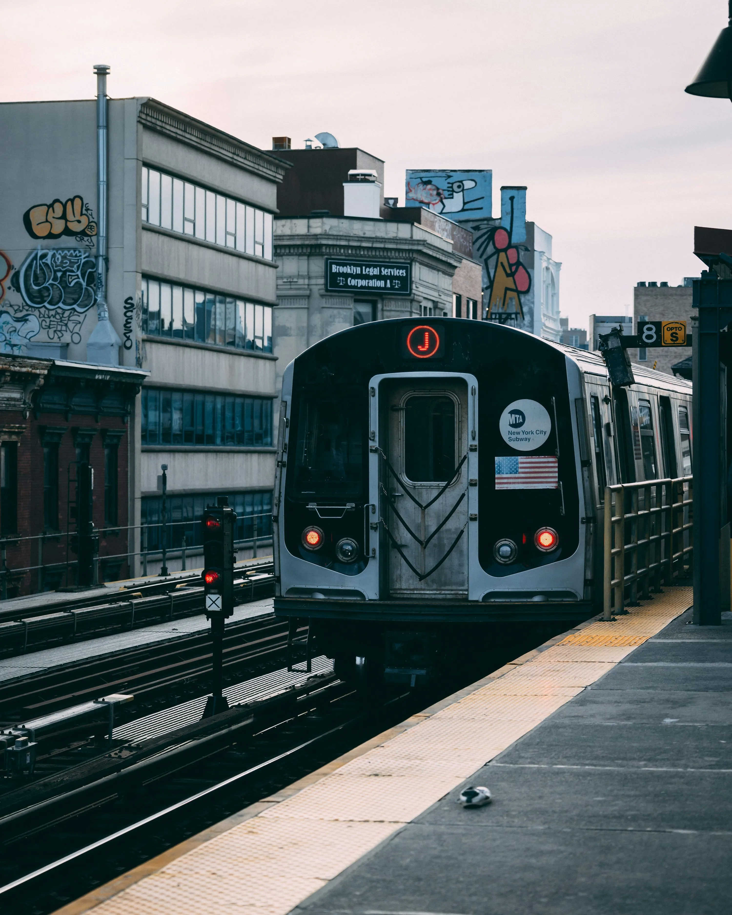 A subway train pulling into a train station photo