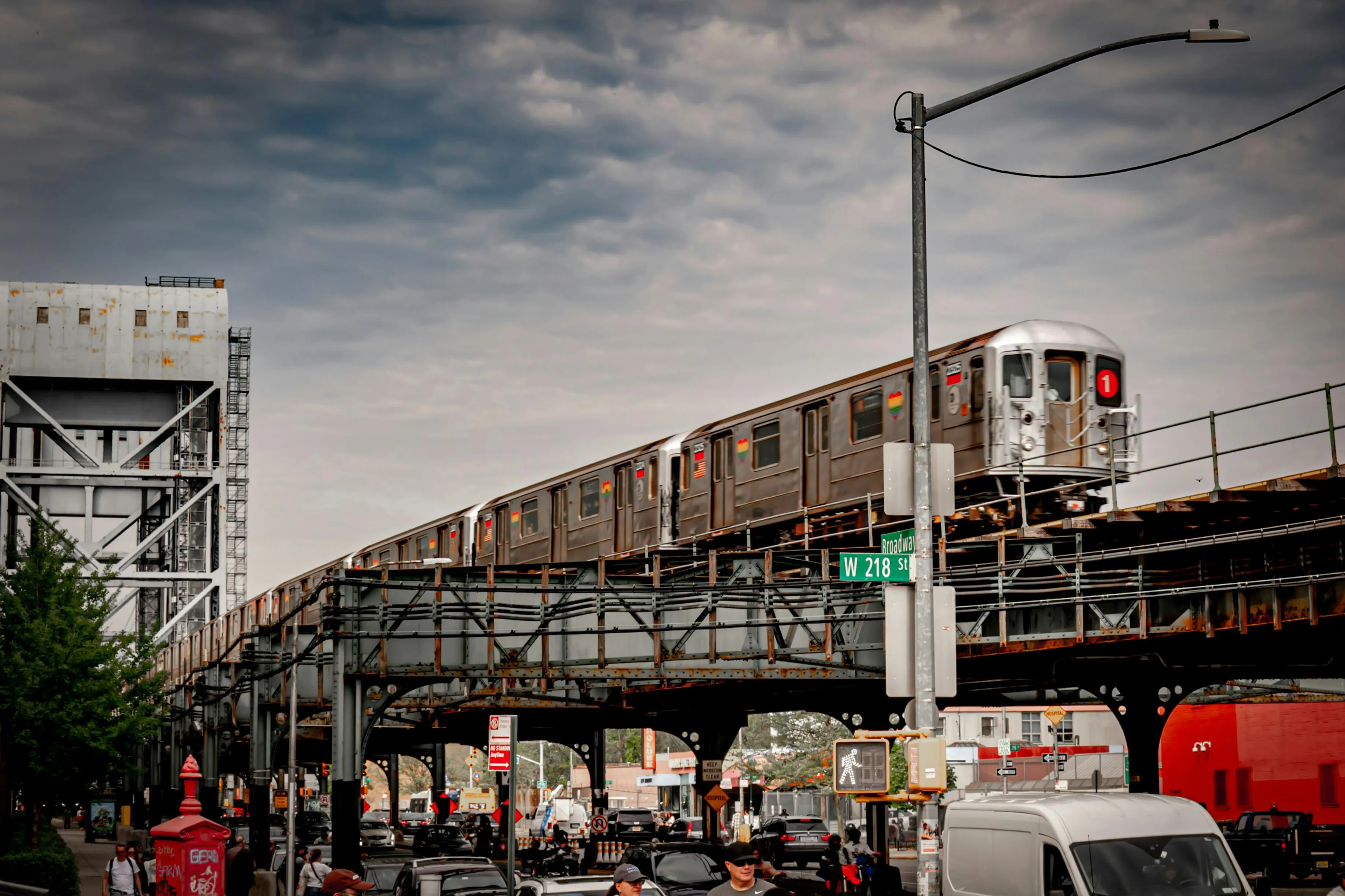 View of a Busy Street and the Subway Train on Elevated Railway in New York City · Free