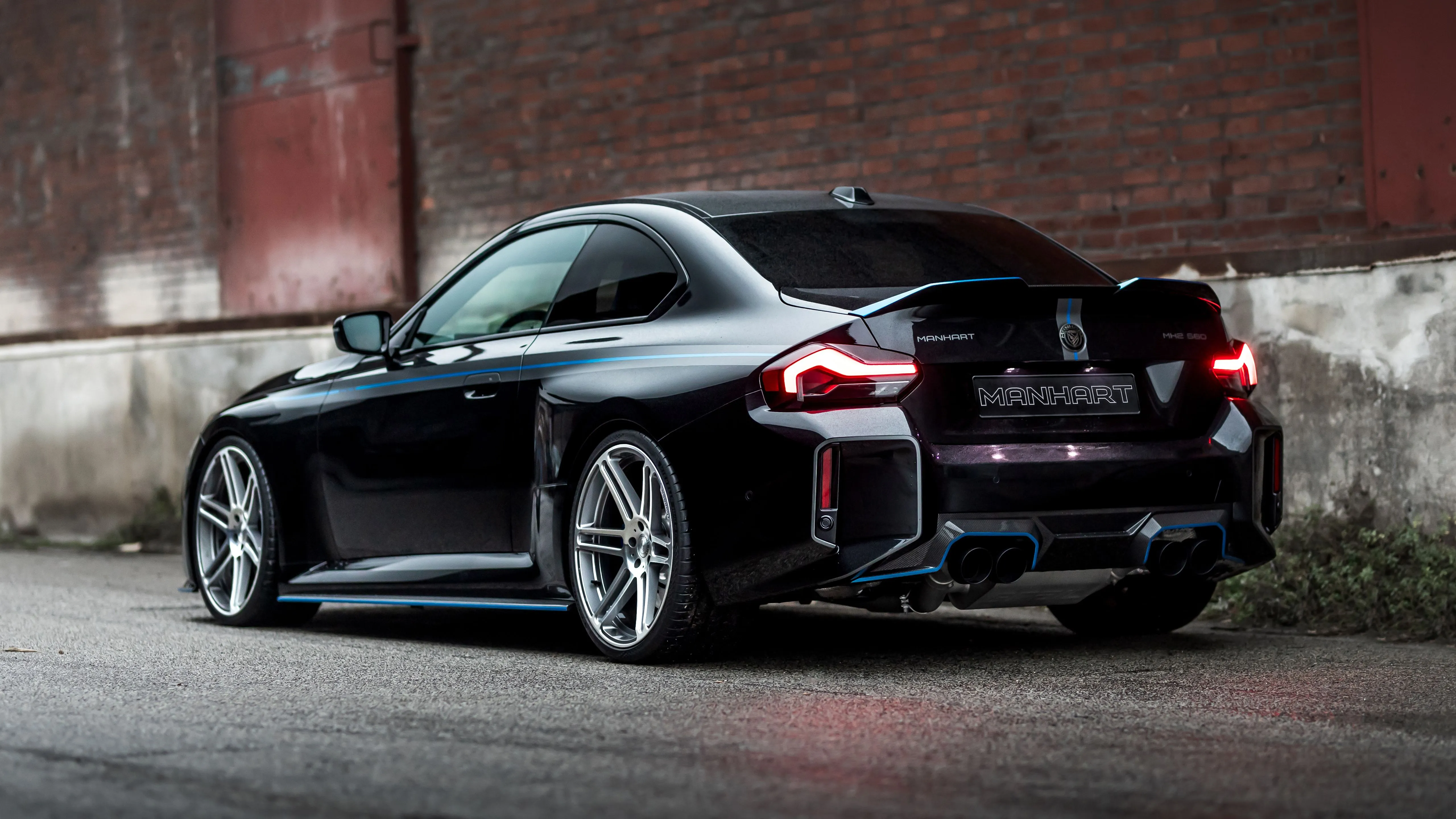 Black car BMW M2 Manhart MH2 560 rear view Desktop wallpaper 600x382