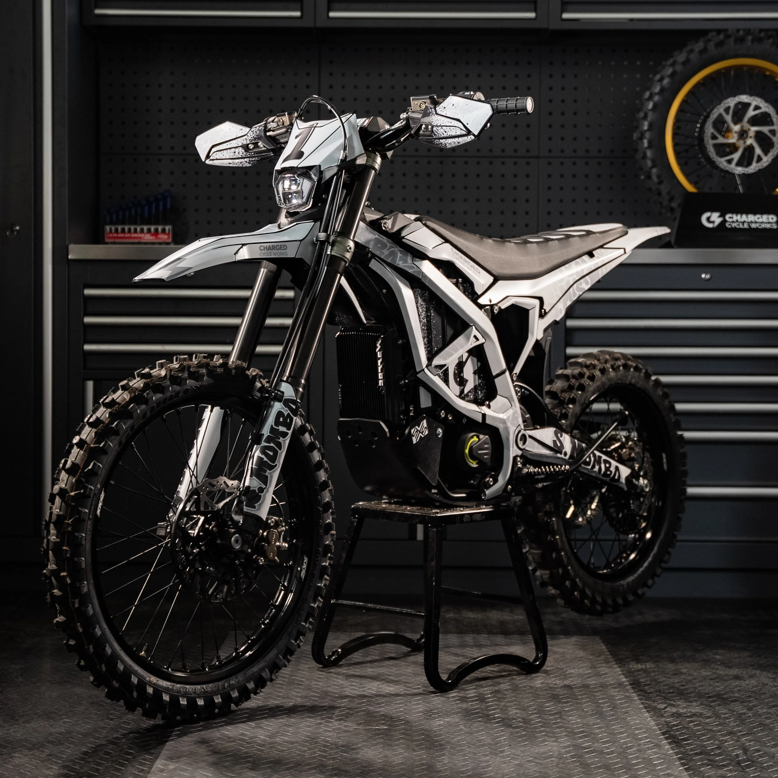 Surron Ultra Bee Vinyl Wraps. E Moto Graphic Decals. Charged Cycle Works