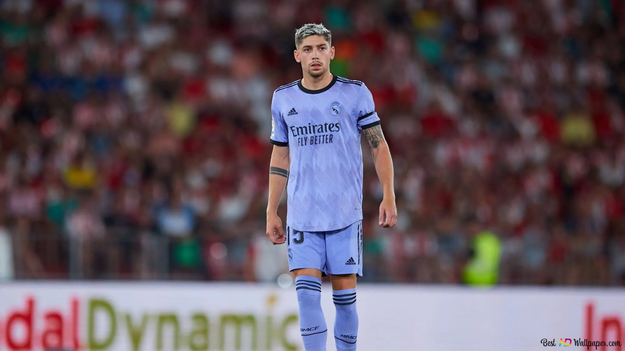 Federico Valverde pose in front of stadium in blur 2K wallpaper download