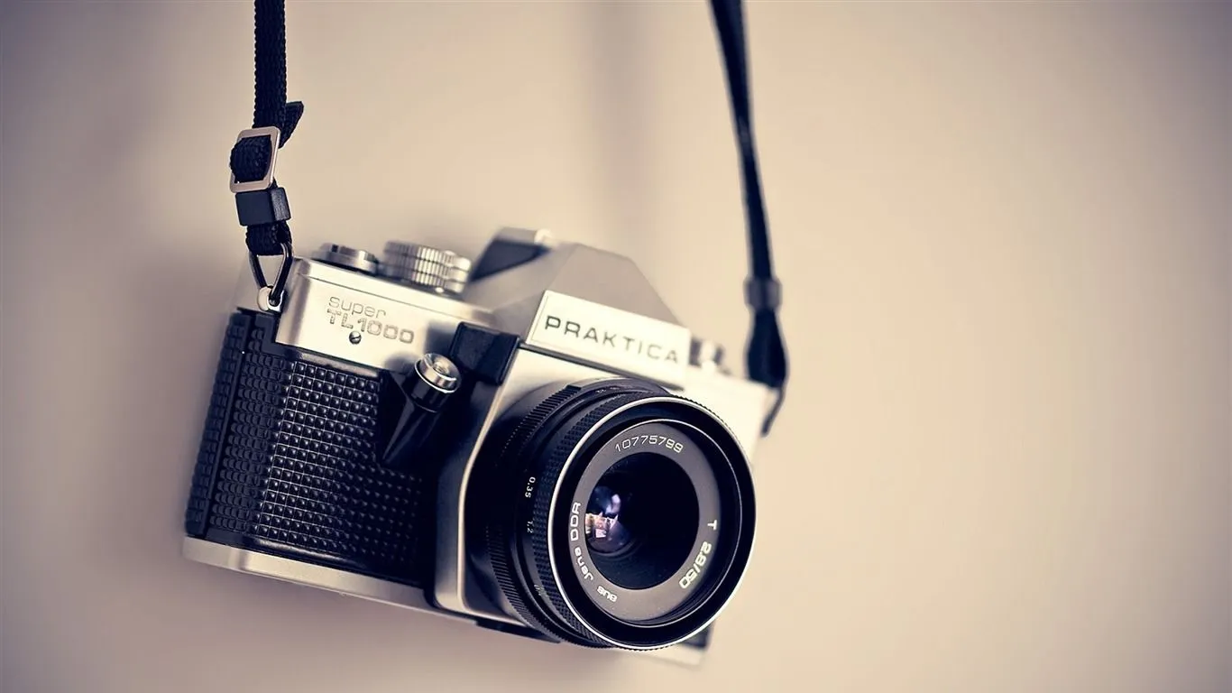 Praktica camera on wall Photo HD Wallpaper