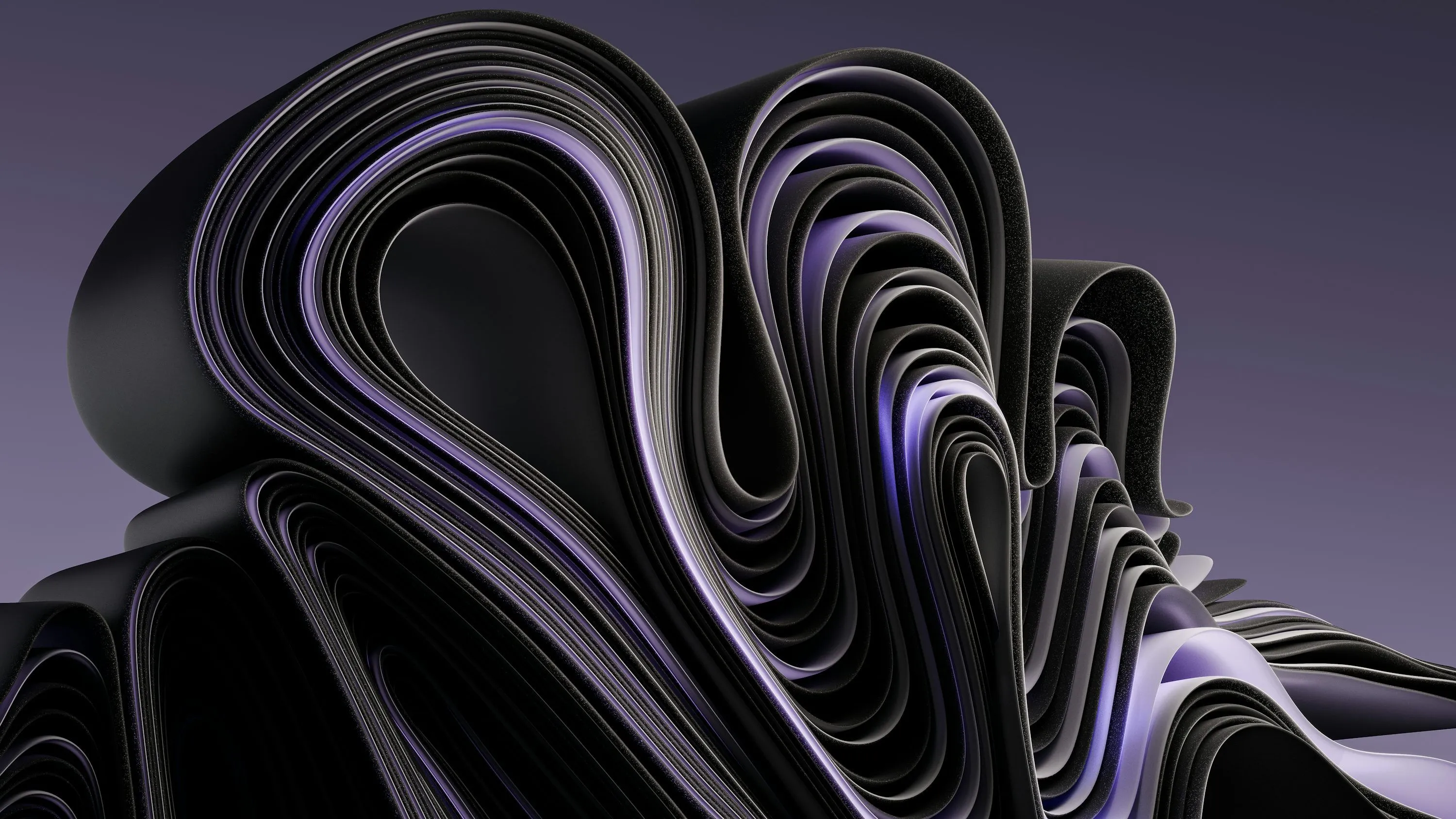 A bunch of black and purple papers stacked on top of each other photo