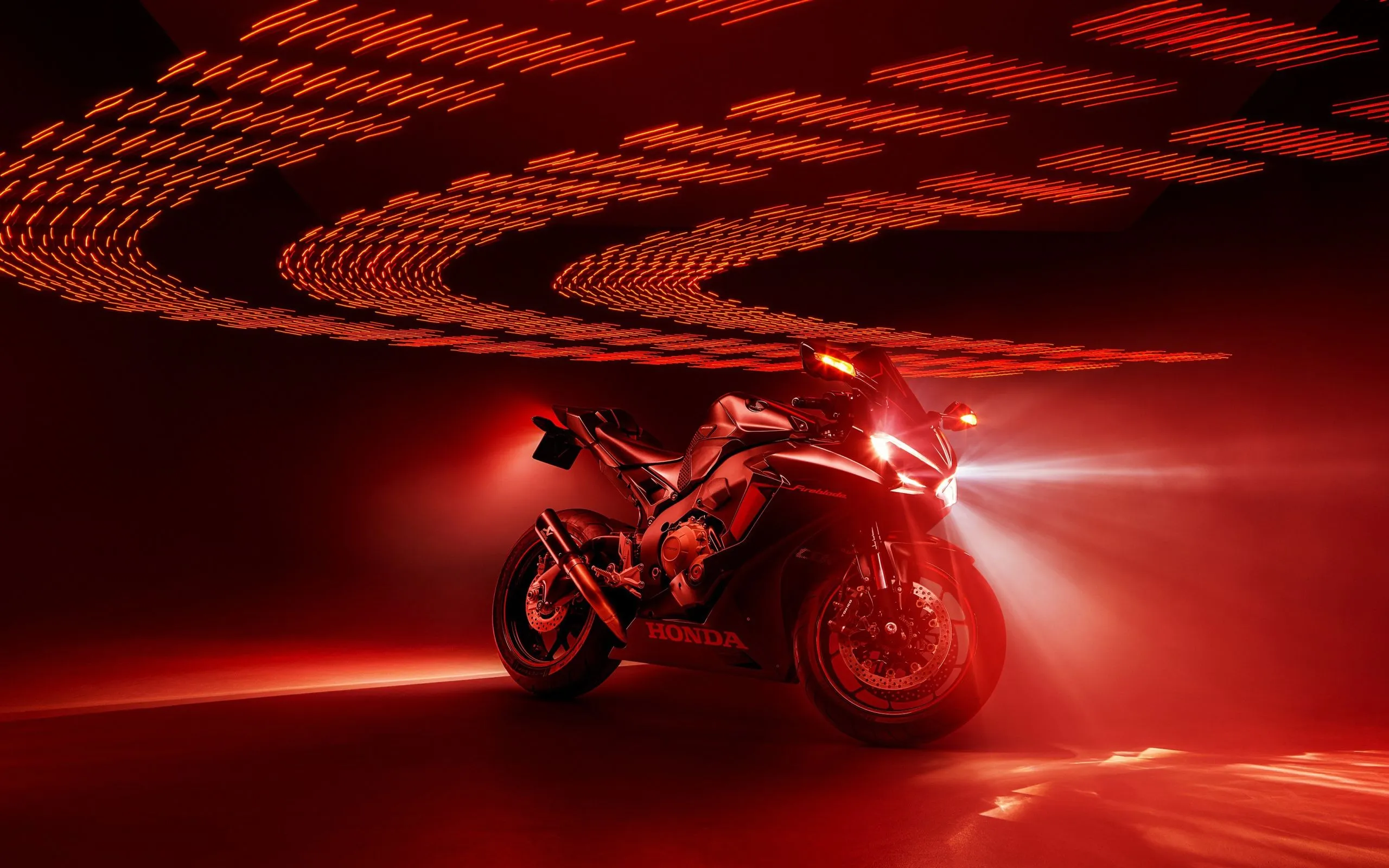 Honda Fireblade motorcycle on a red background Desktop wallpaper 2560x1600