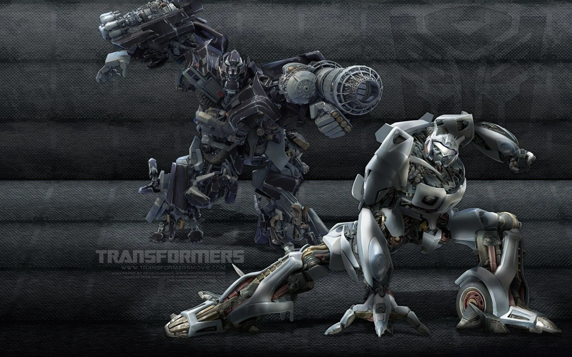 Two silver robots on a gray background
