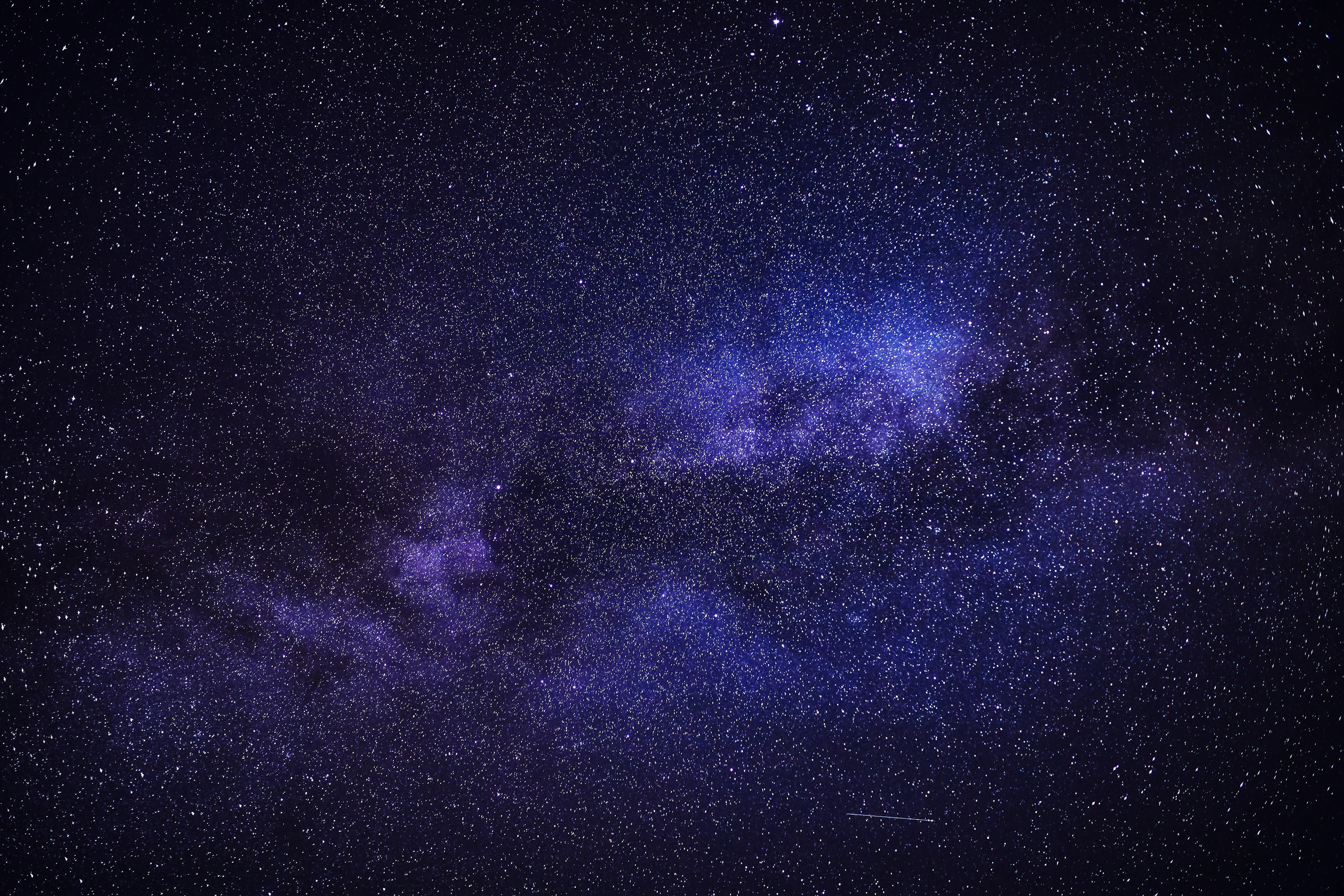 Purple and black sky with stars photo