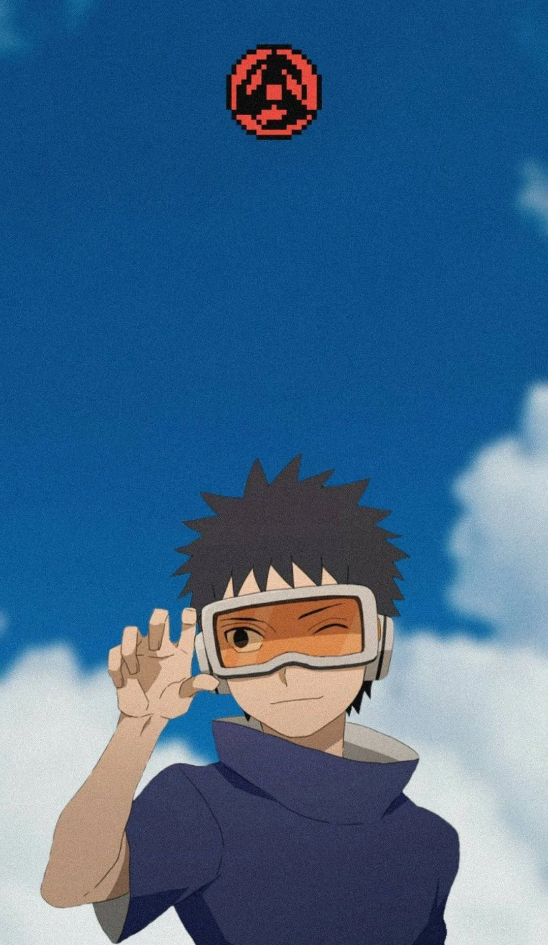 Download A Young Obito Showing Strength and Courage Wallpaper