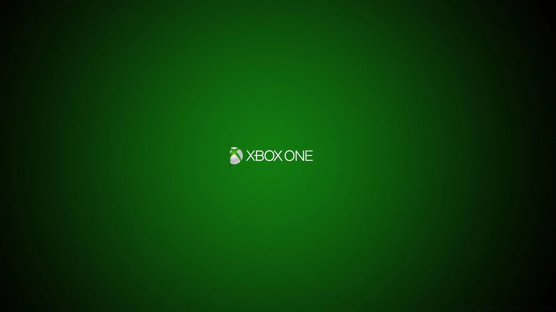 The logo of the Xbox One console in spotlight on a green background