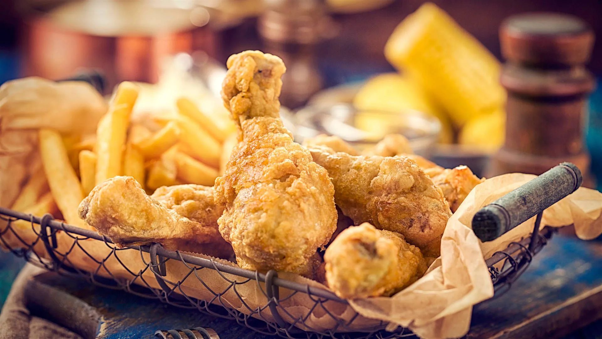 Download Delectable Sheesh Fried Chicken Served with Crispy Potato Fries Wallpaper