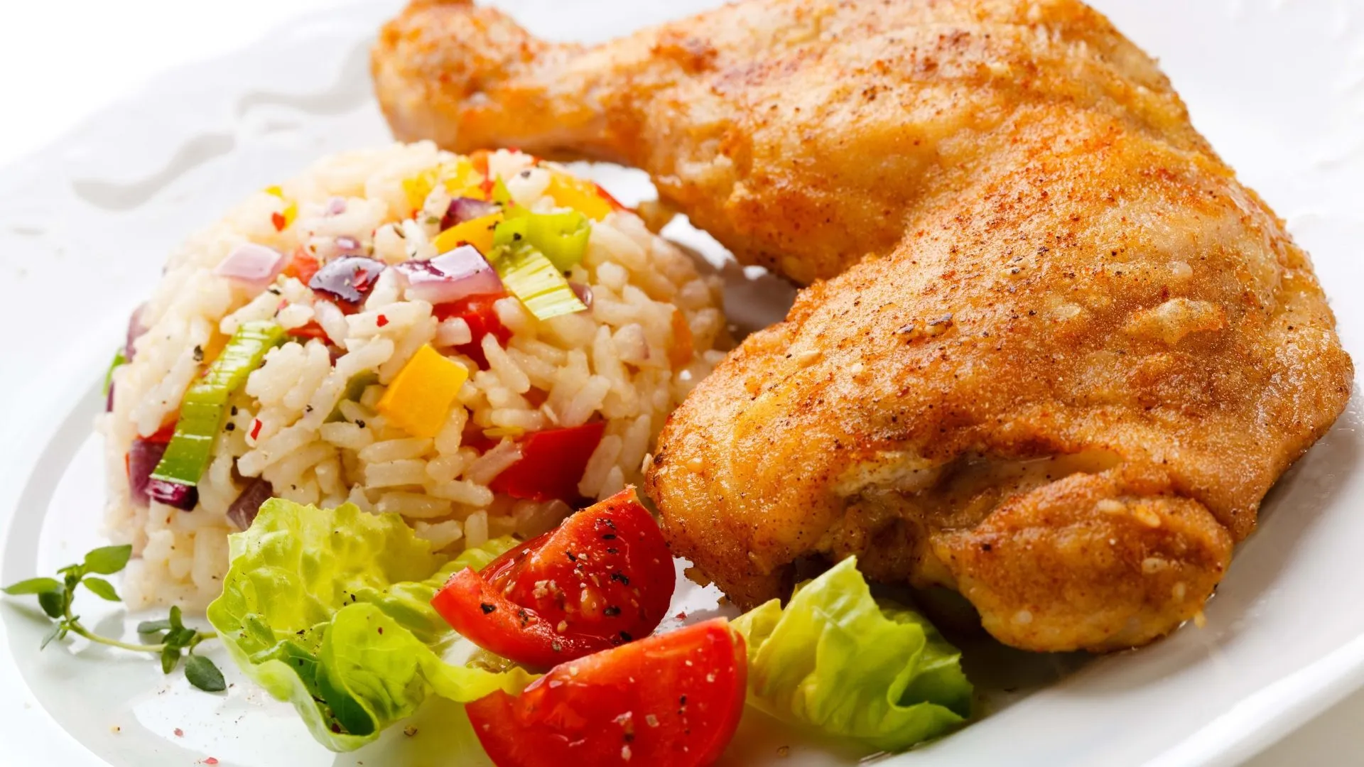 Appetizing fried chicken leg with rice and vegetables Desktop wallpaper 1920x1080