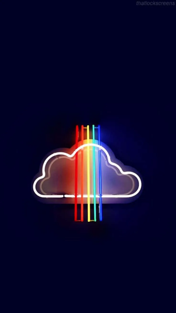 Download A Neon Cloud With Rainbow Colored Lights Wallpaper