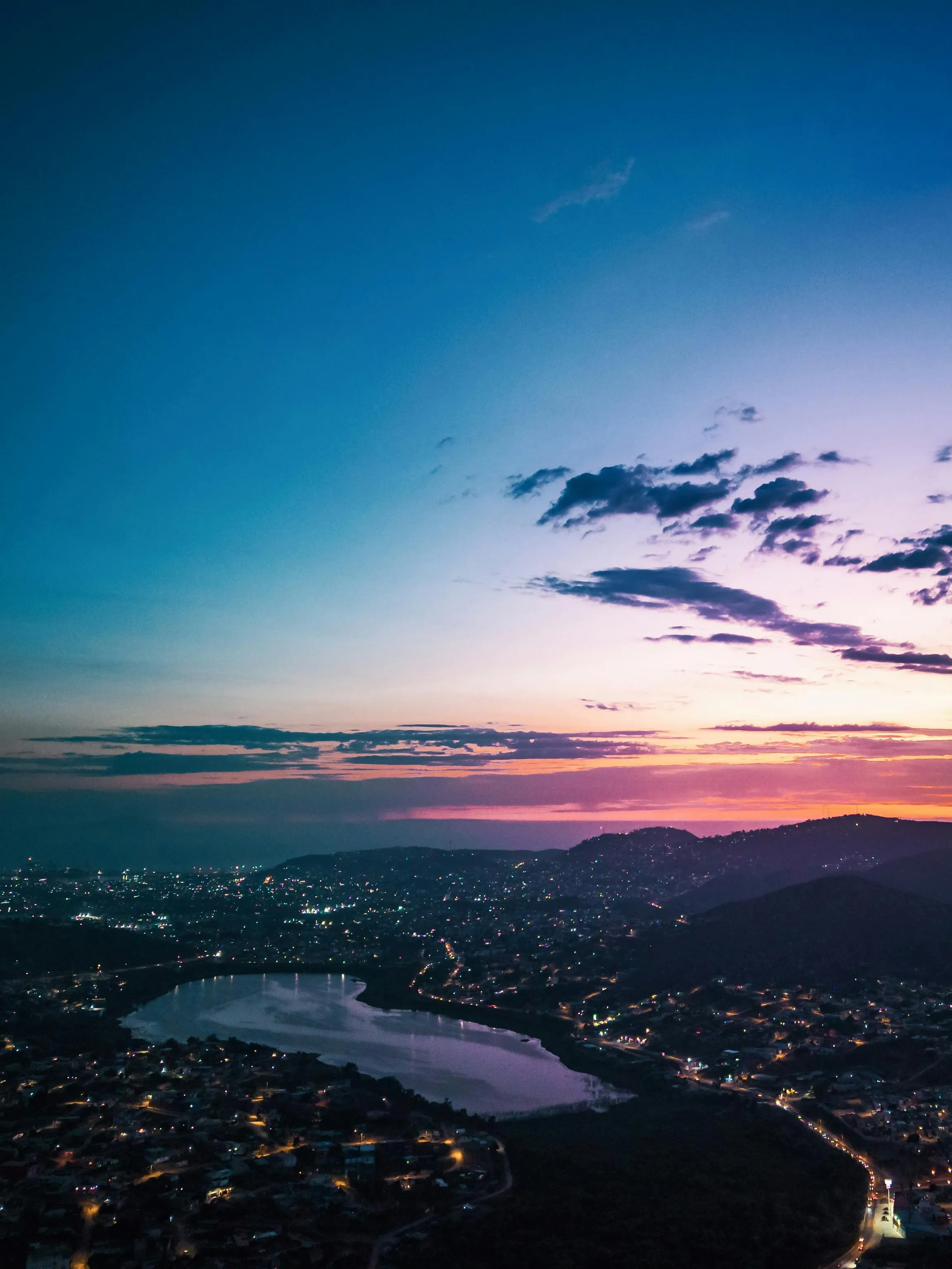 Darkness over City at Sunset · Free