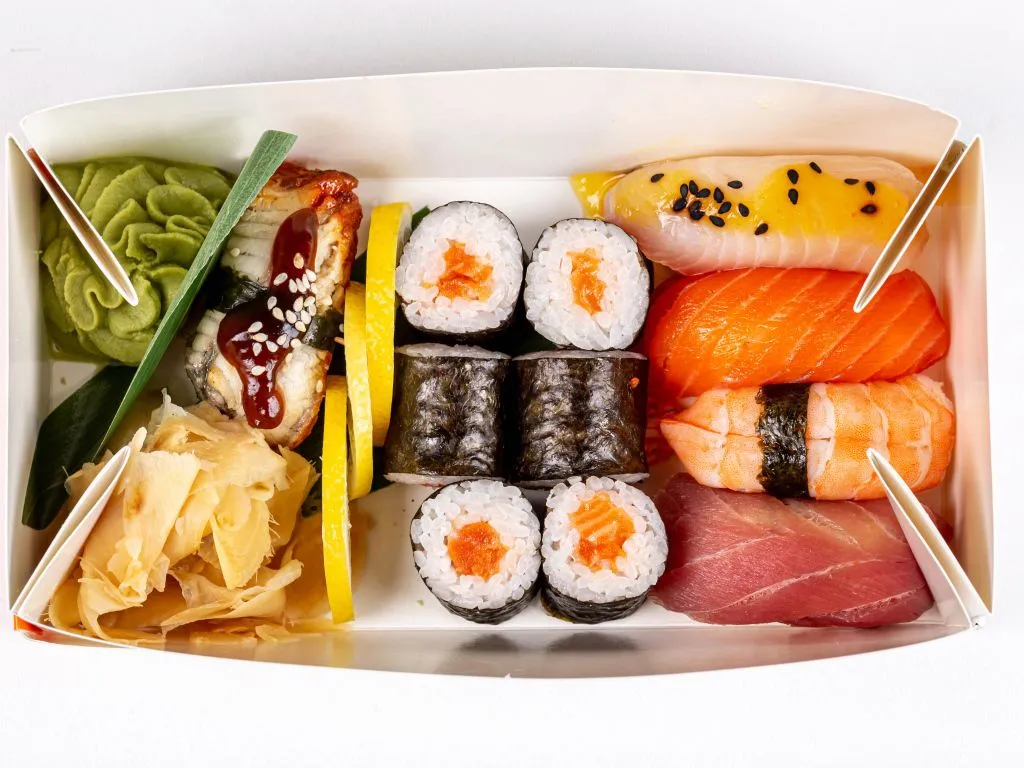 Japanese sushi in a box on a white plate Desktop wallpaper 1024x768