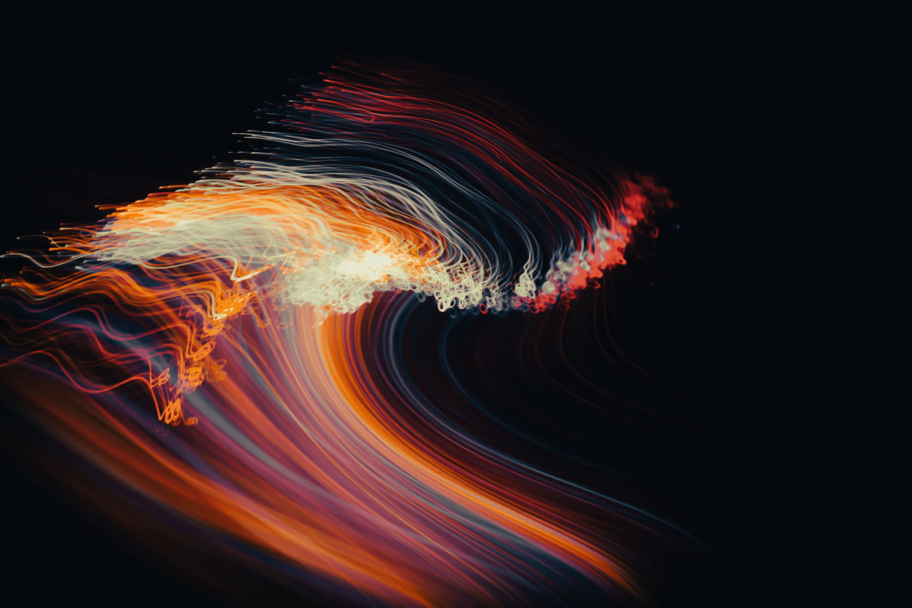 An abstract image of a wave in the dark photo