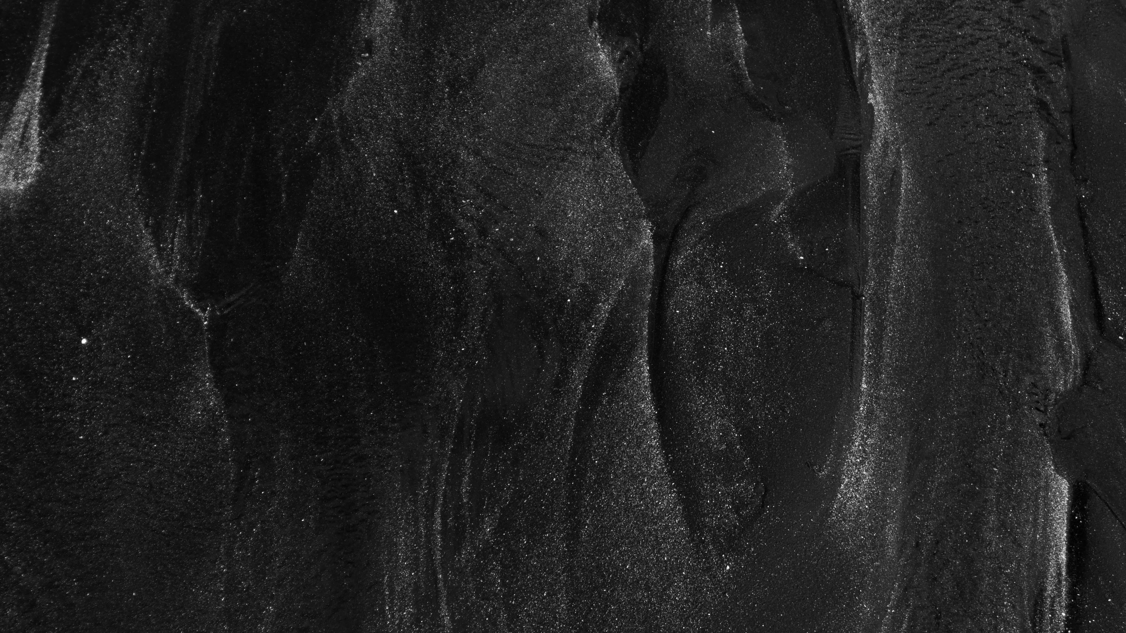 Download wallpaper 3840x2160 sand, black, relief, surface, granules 4k uhd 16:9 HD background