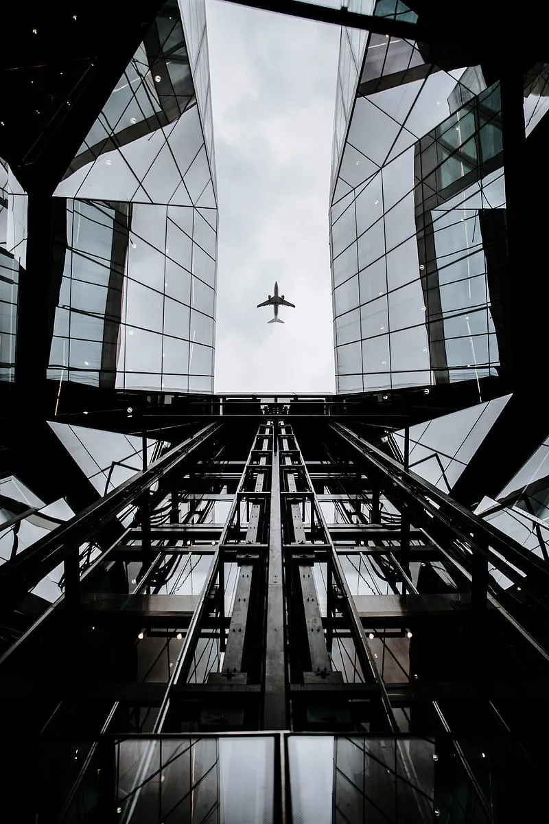Modern architecture, worm's eye view, airplane, sky, building, City, HD phone wallpaper