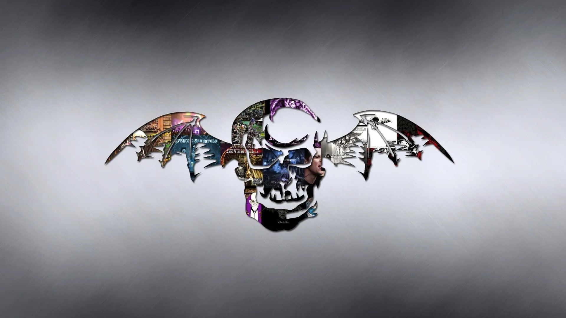 Download A Skull With Wings On It Wallpaper