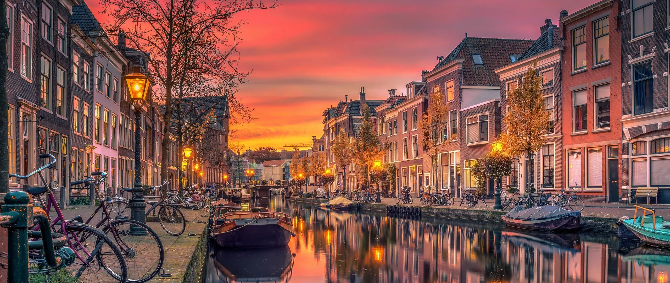 Download wallpaper 2560x1080 netherlands, holland, canal, river, buildings dual wide 1080p HD background