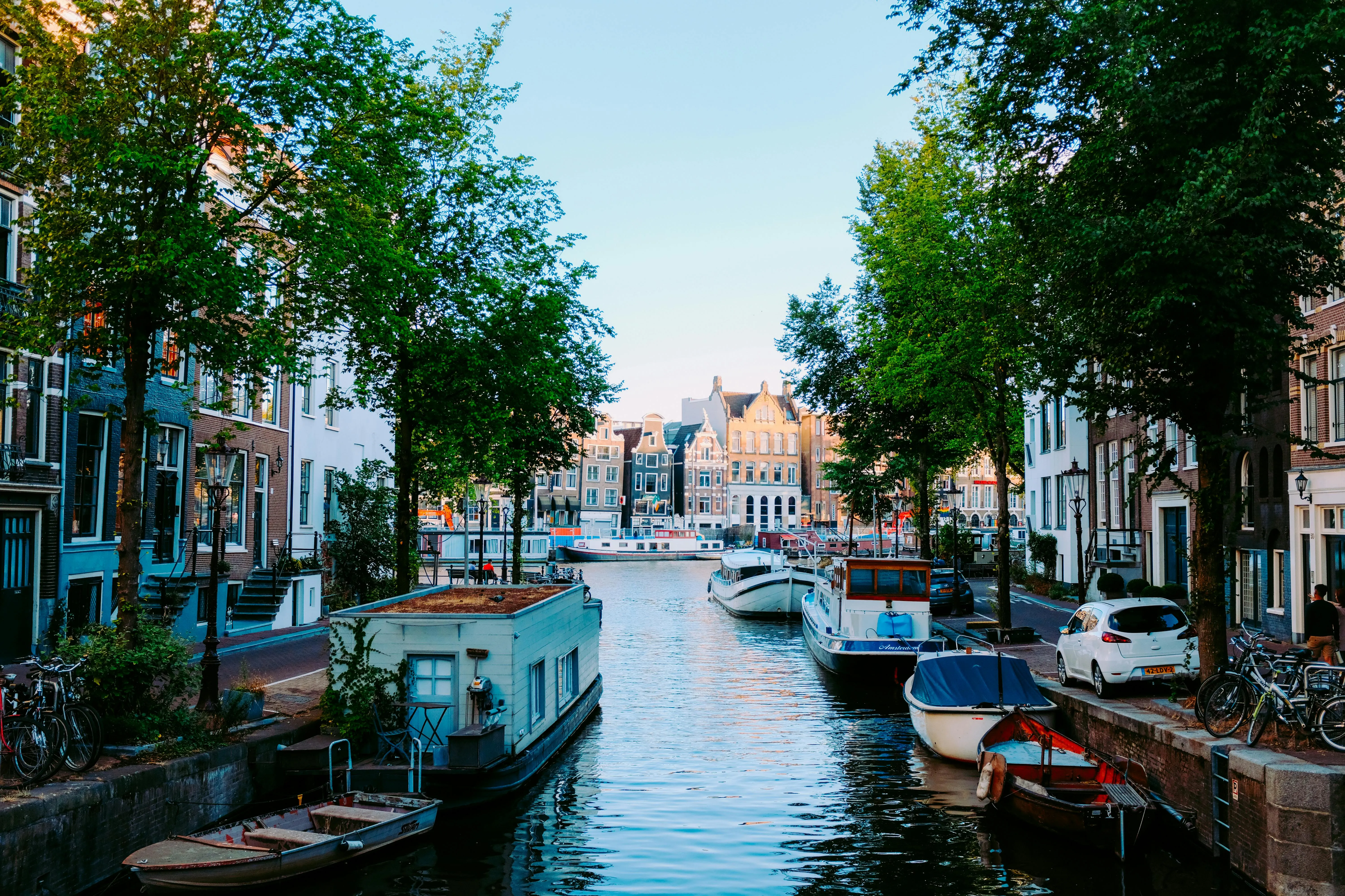 Scenery of old city situated on calm channel · Free