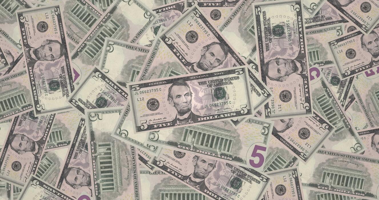 Mountain of banknotes of five dollars americans, cash money