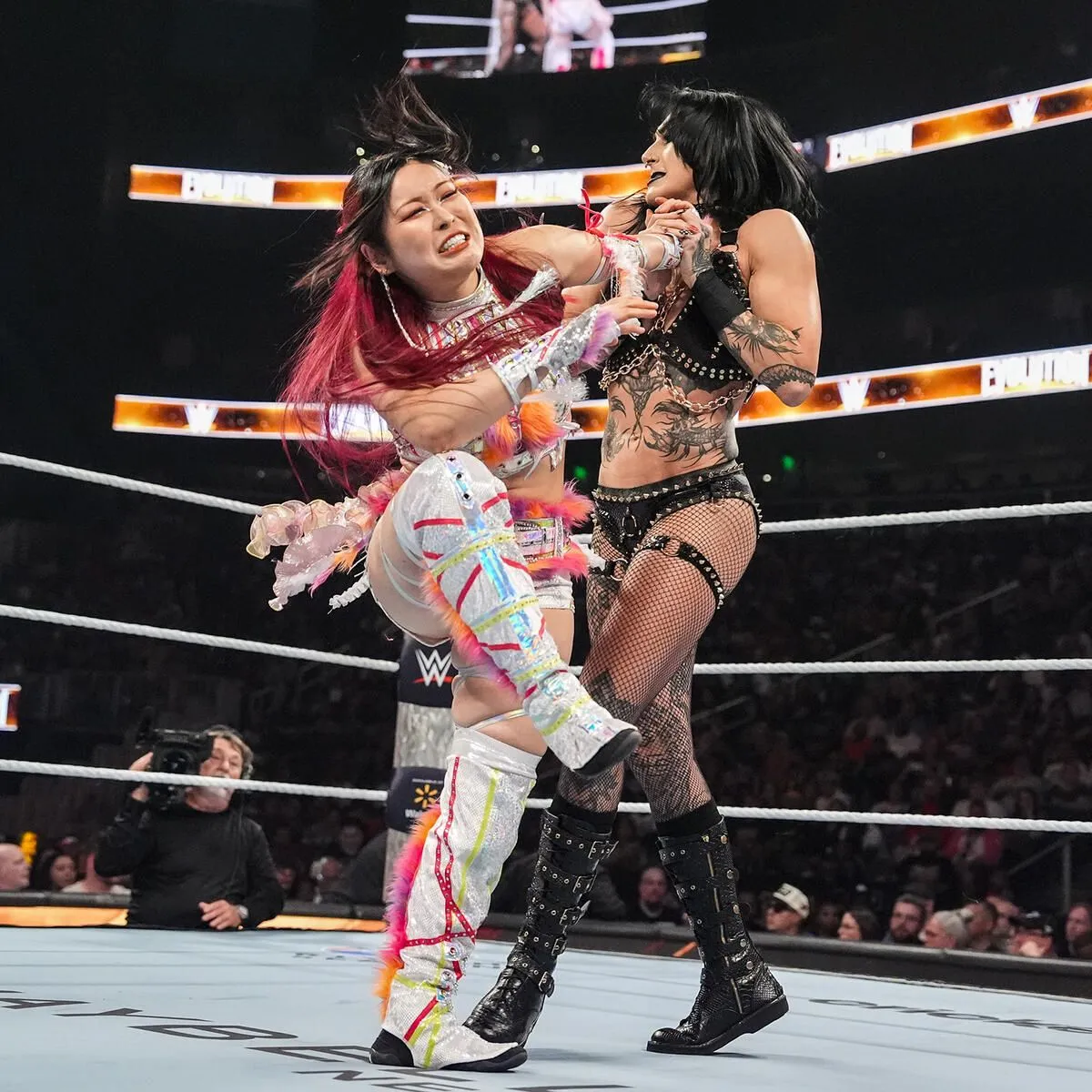 IYO SKY vs. Rhea Ripley. Women's World Title Match: photoWWE