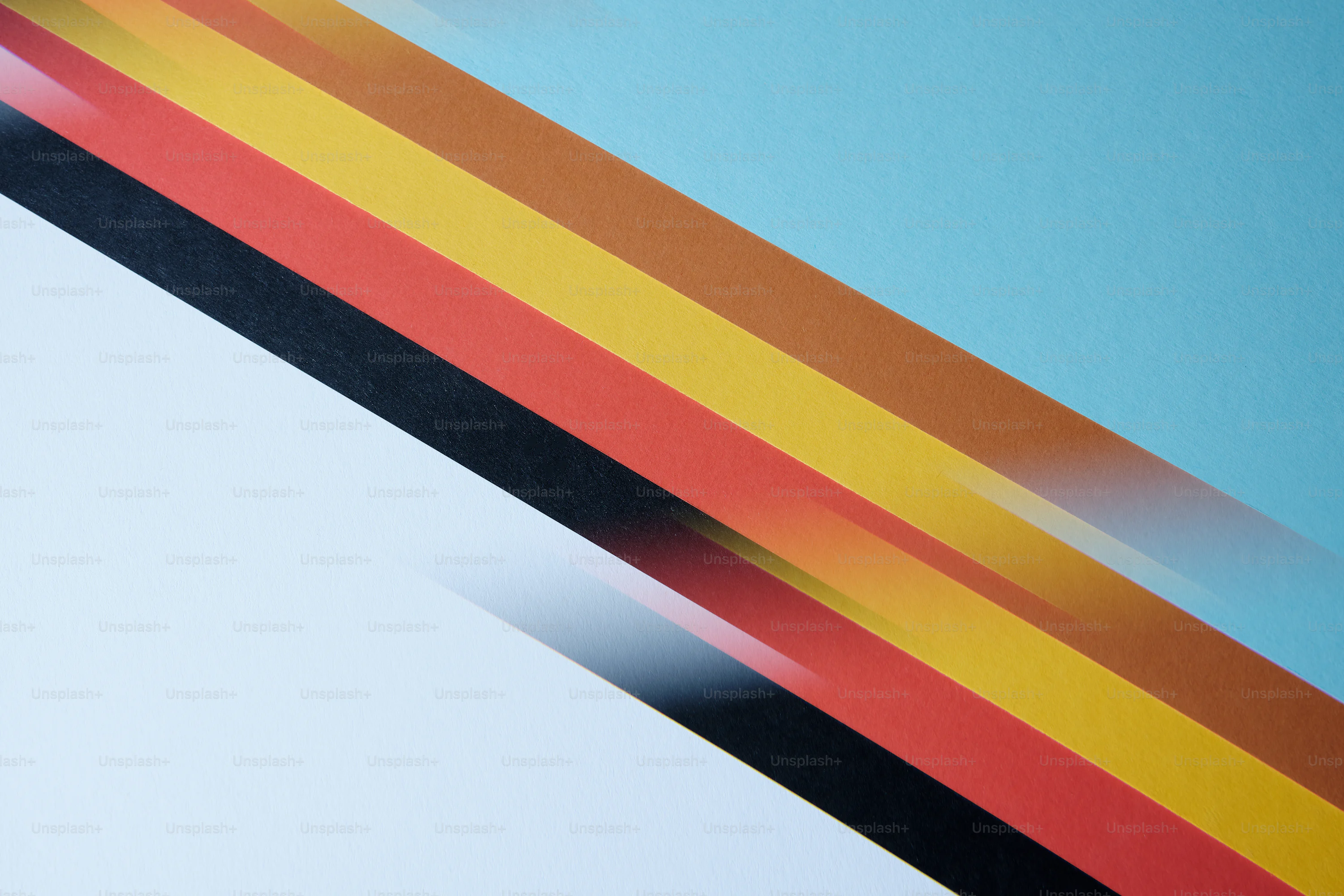 A close up of a multicolored striped wallpaper photo