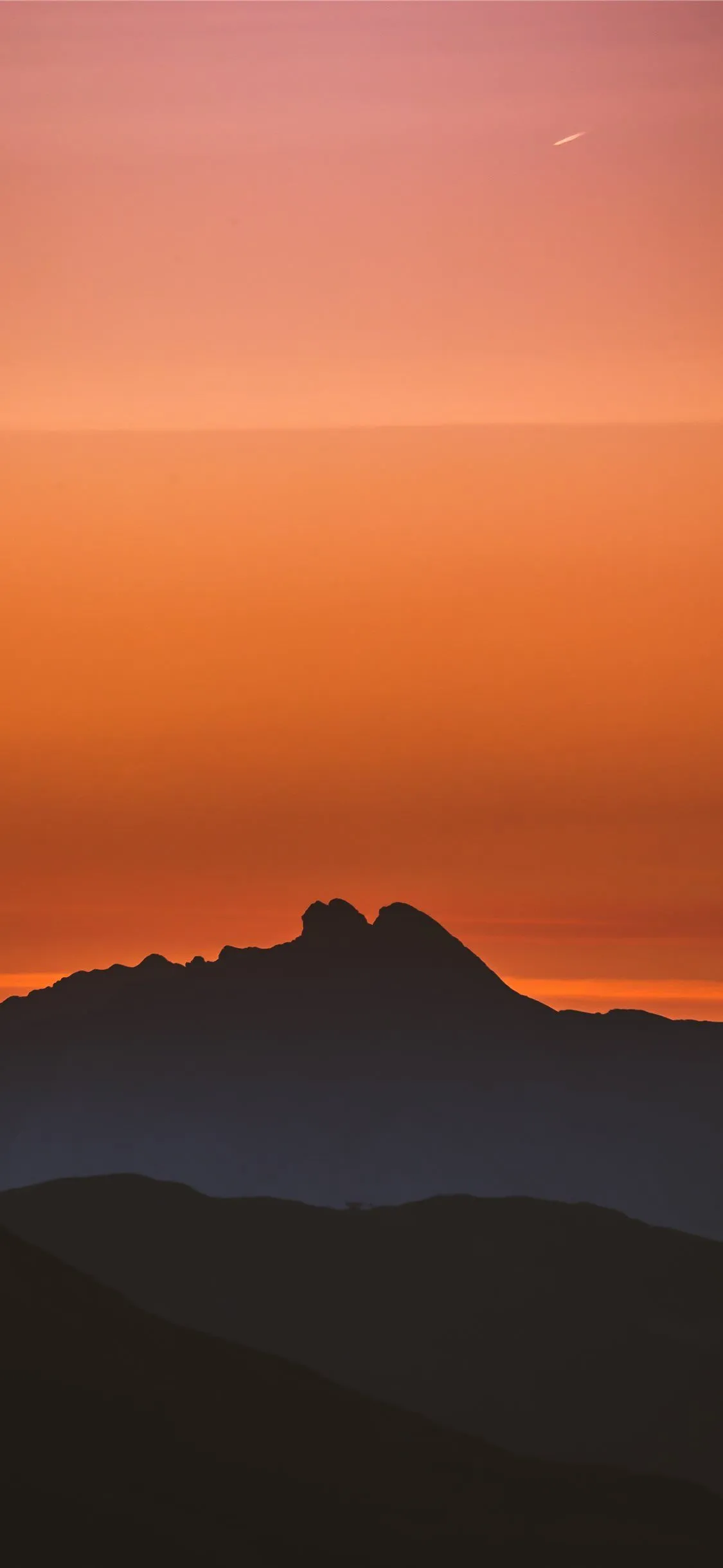silhouette of mountain during golden hour iPhone X Wallpaper Free Download