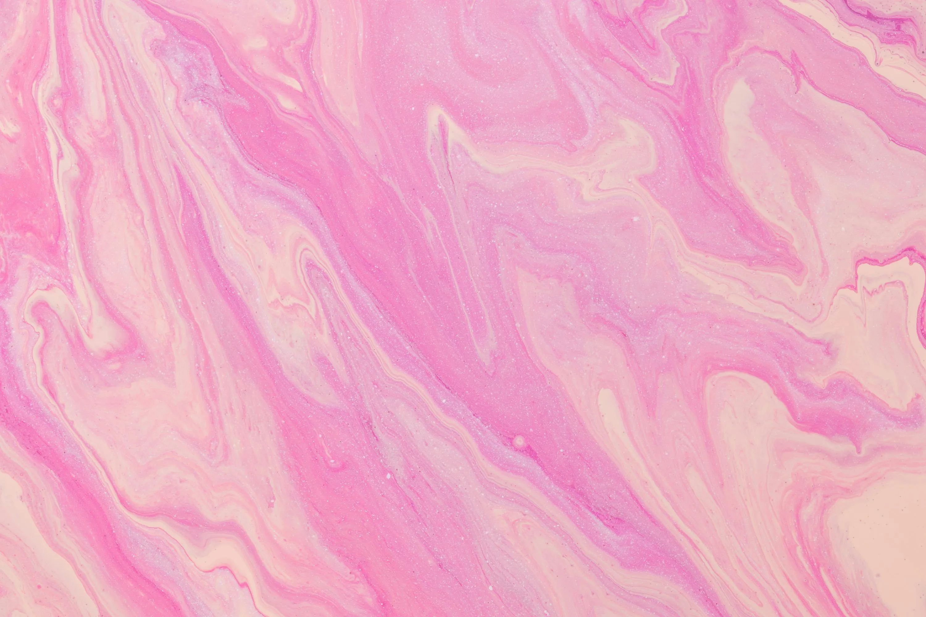 A close up of a pink and white marble photo