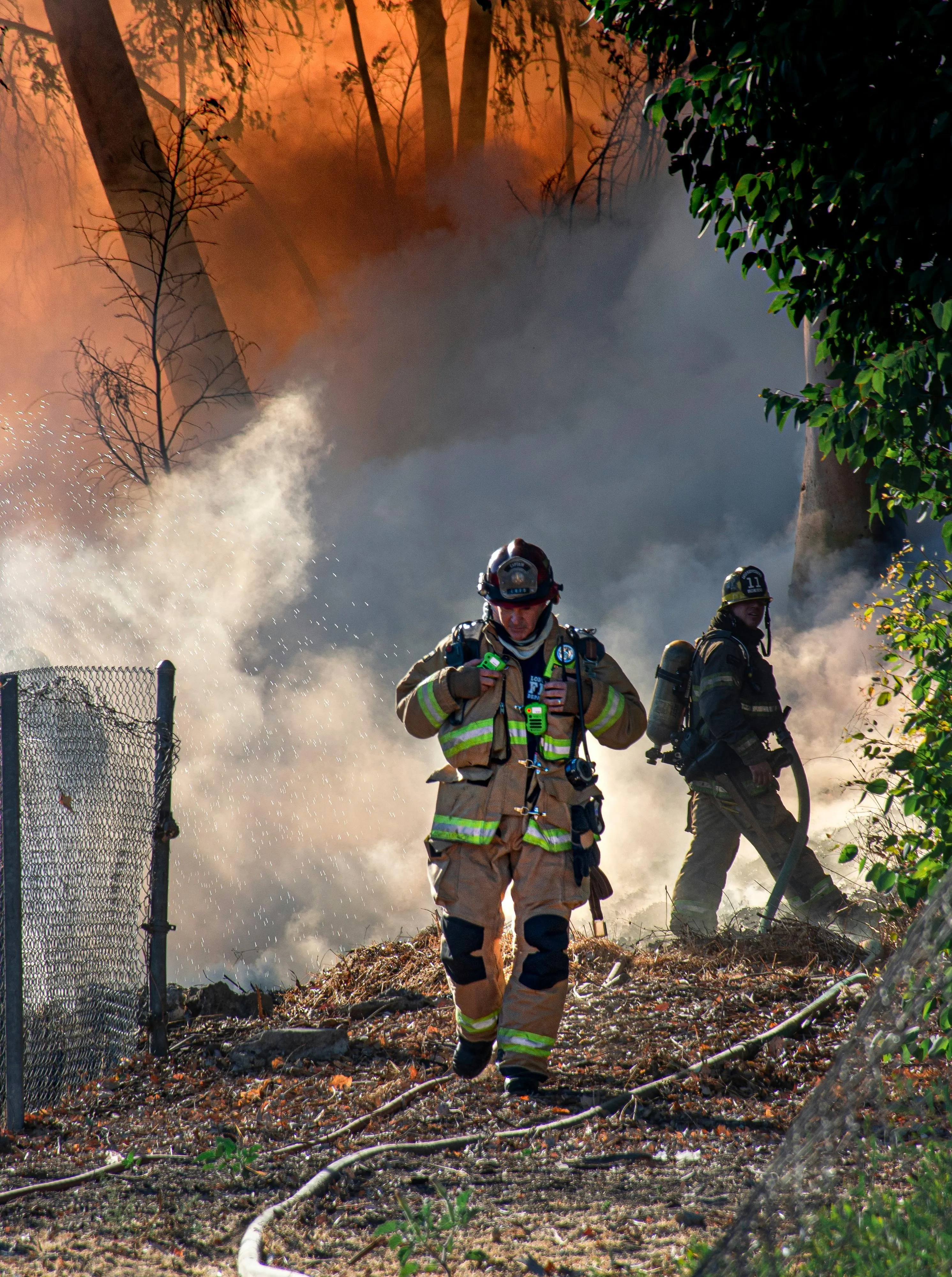 Fireman Walking on Pathway · Free