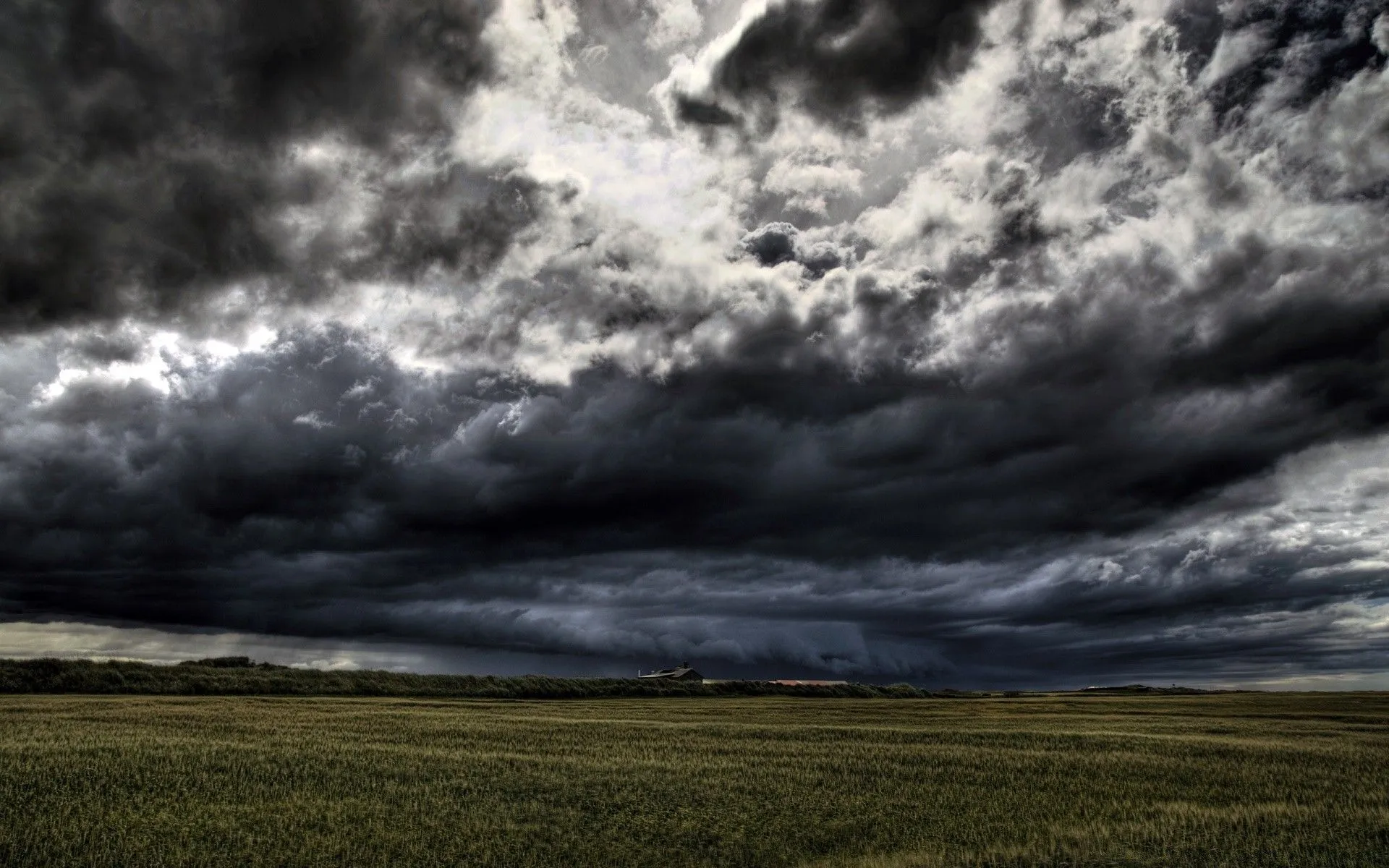 Dark clouds float over the field