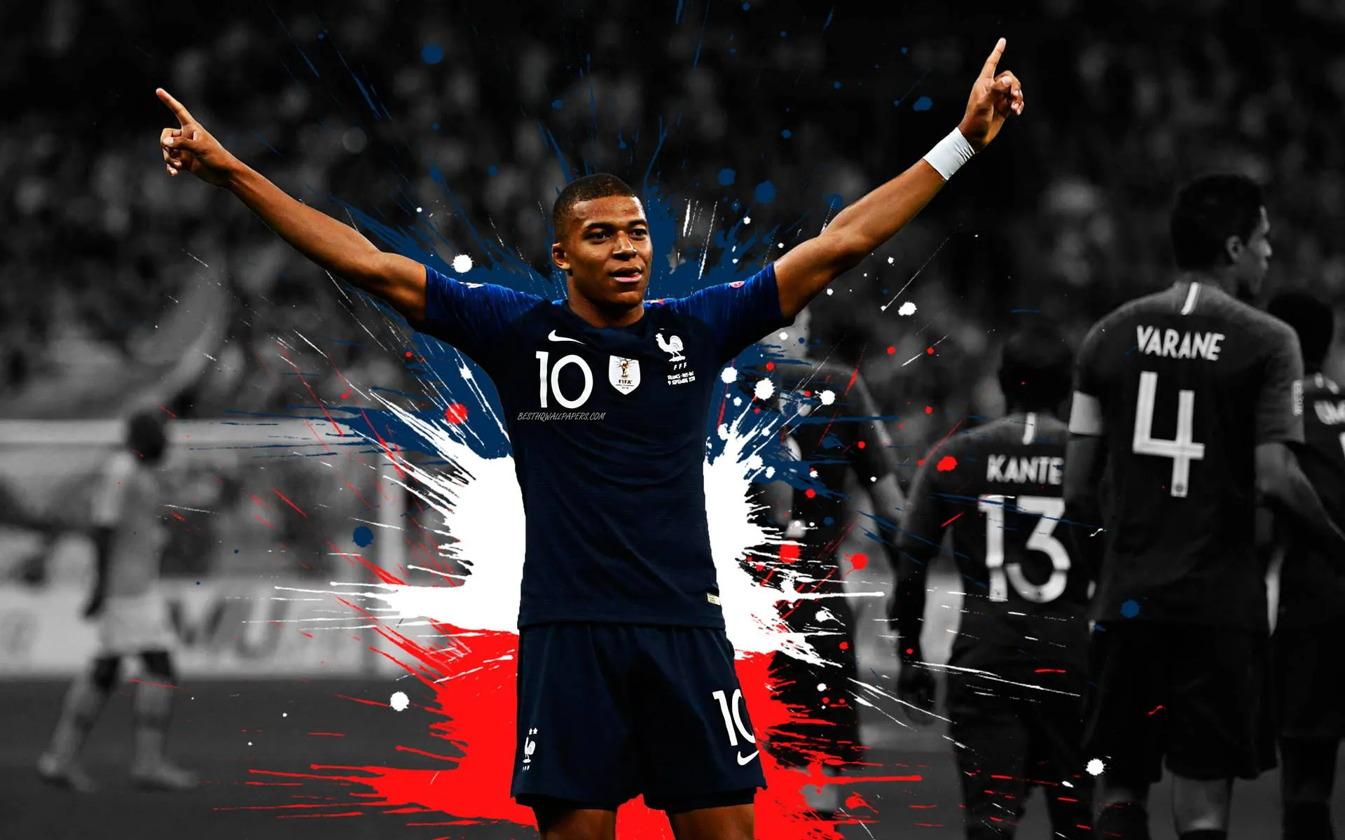 Download Kylian Mbappe Winning Pose Wallpaper