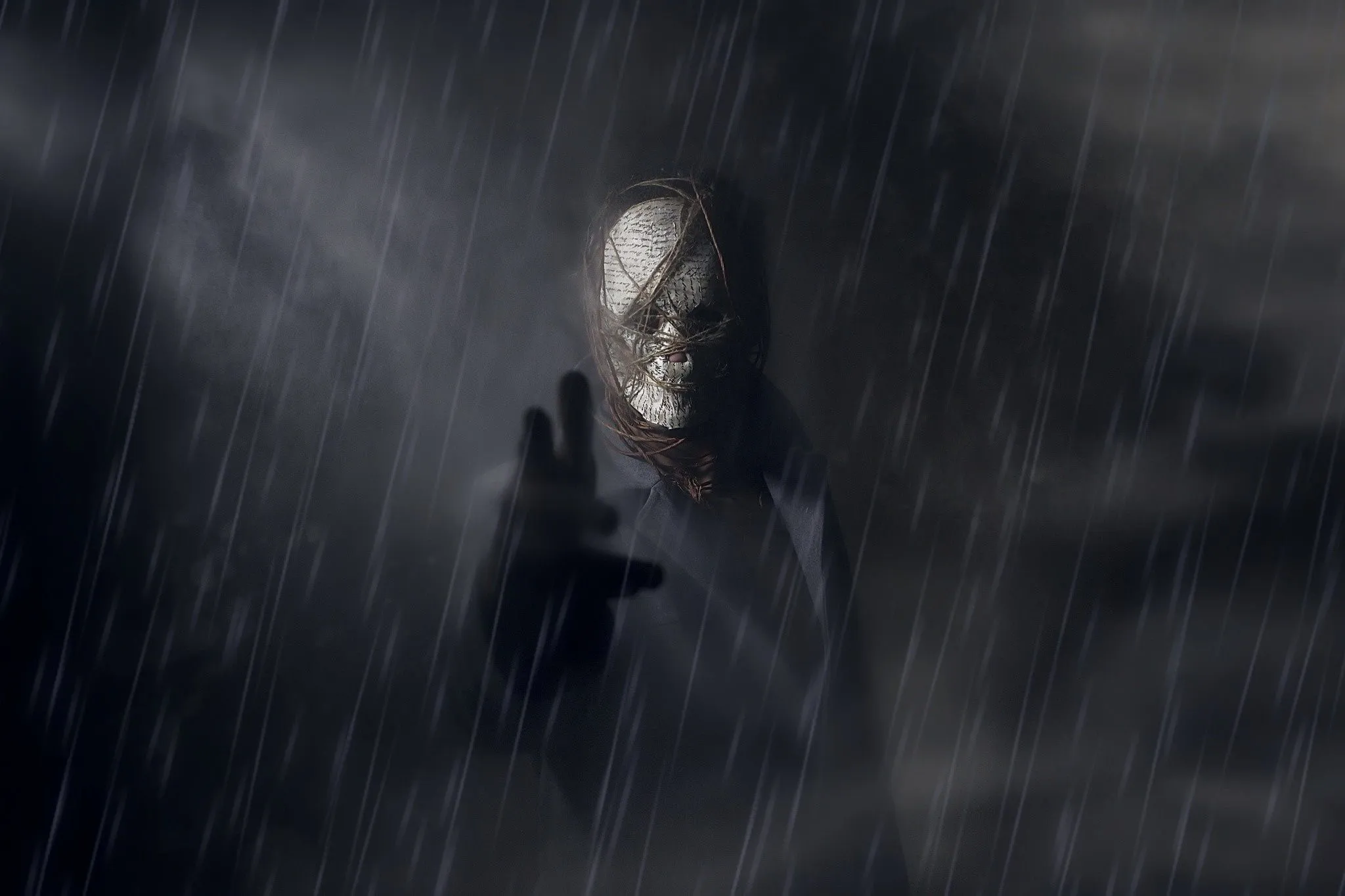 A Figure With A Masked Face In The Rain HD Wallpaper