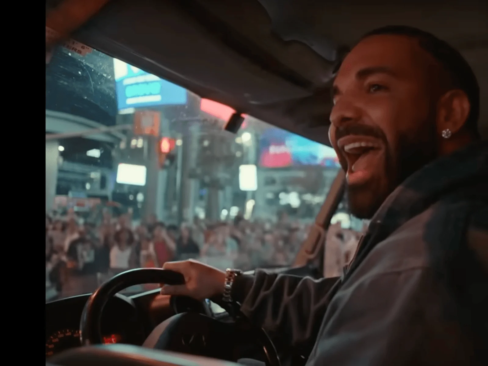 Drake was spotted driving an ice delivery truck around downtown Toronto
