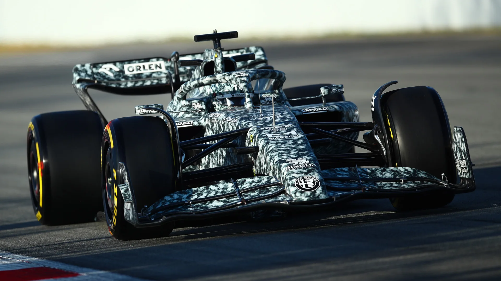 Alfa Romeo run special livery for C42's first public outing in Barcelona. Formula 1®