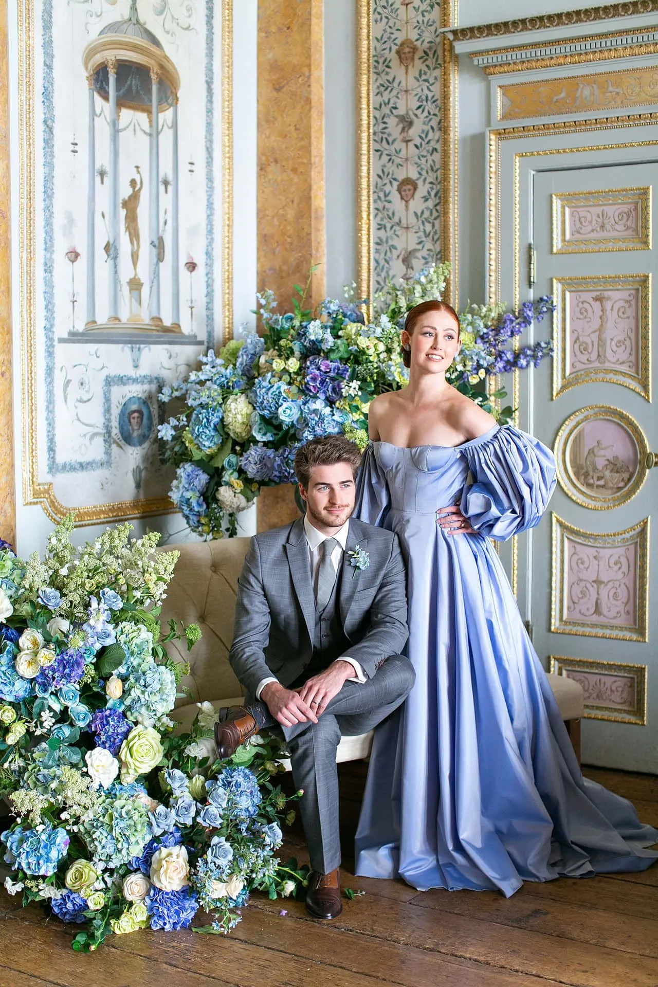Download Regency Era Couple Posingin Opulent Room Wallpaper