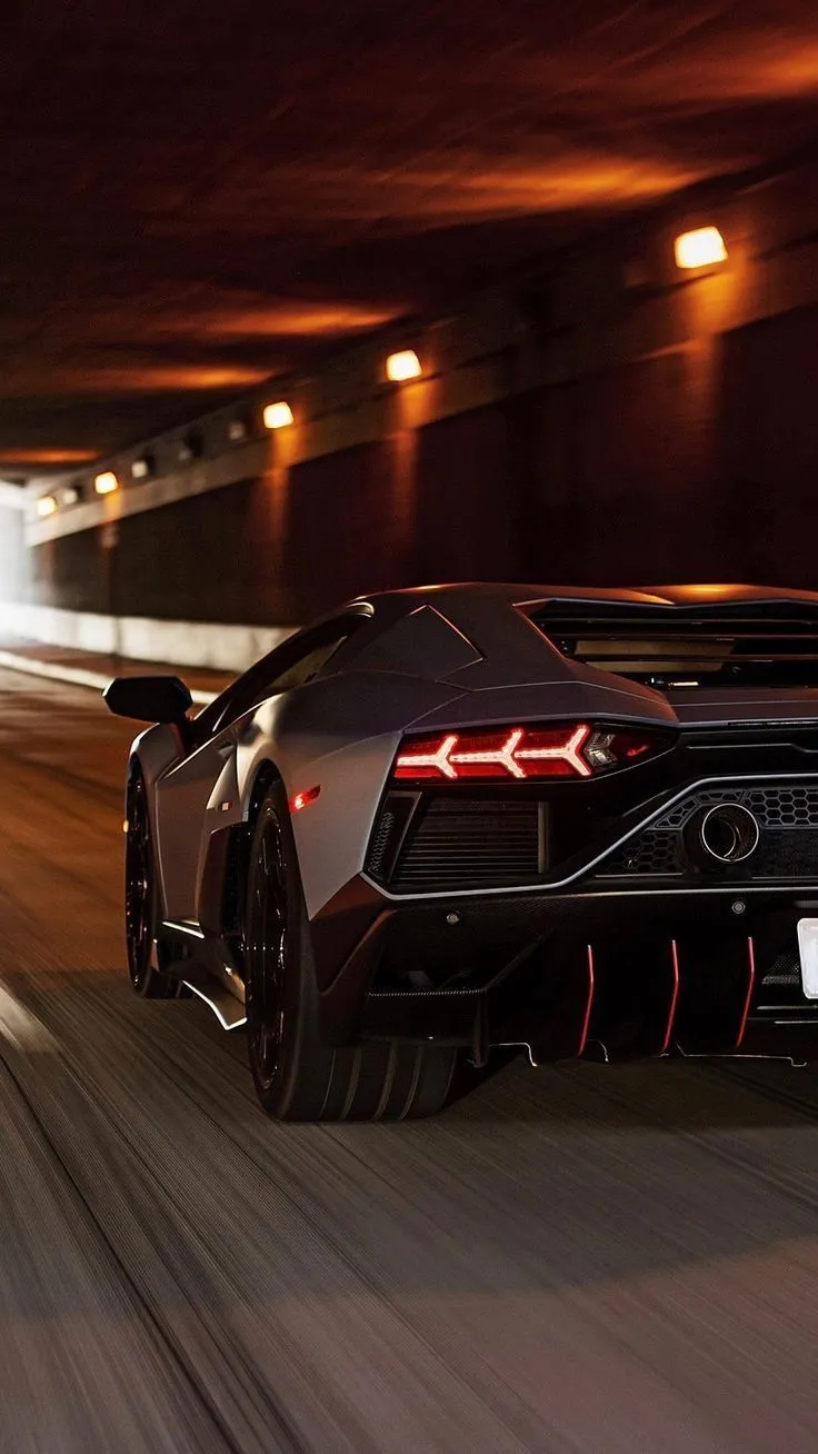 Black Lamborghini Veneno in a Tunnel. Black sports car speed, Black sports car driving on highway, Black sports car driving