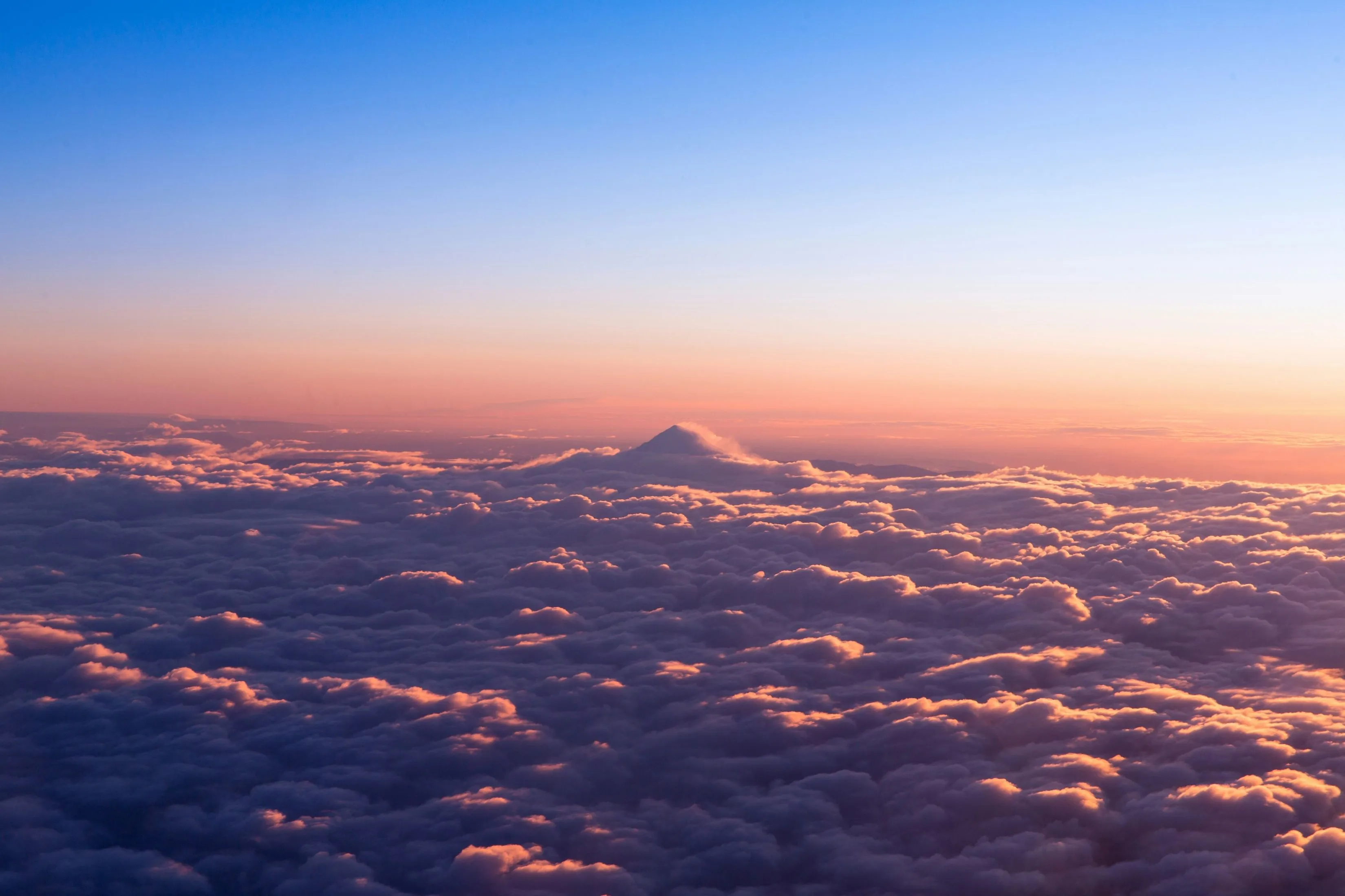 Sunset From Above The Clouds