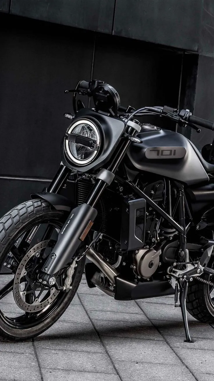 Husqvarna Svartpilen 701 4K Ultra HD Mobile Wallpaper. Husqvarna poster, Black motorcycle parked on cobblestone street, Black motorbike parked on street