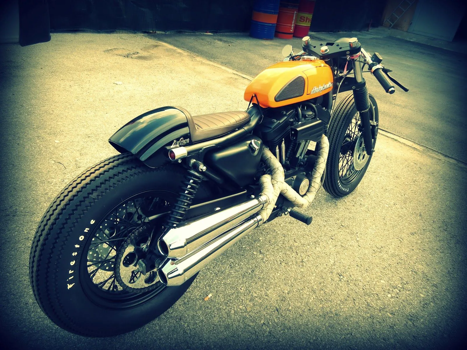 Chrome & Amber: Harley‑Davidson 883 Cafe Racer (HD Wallpaper)x1200