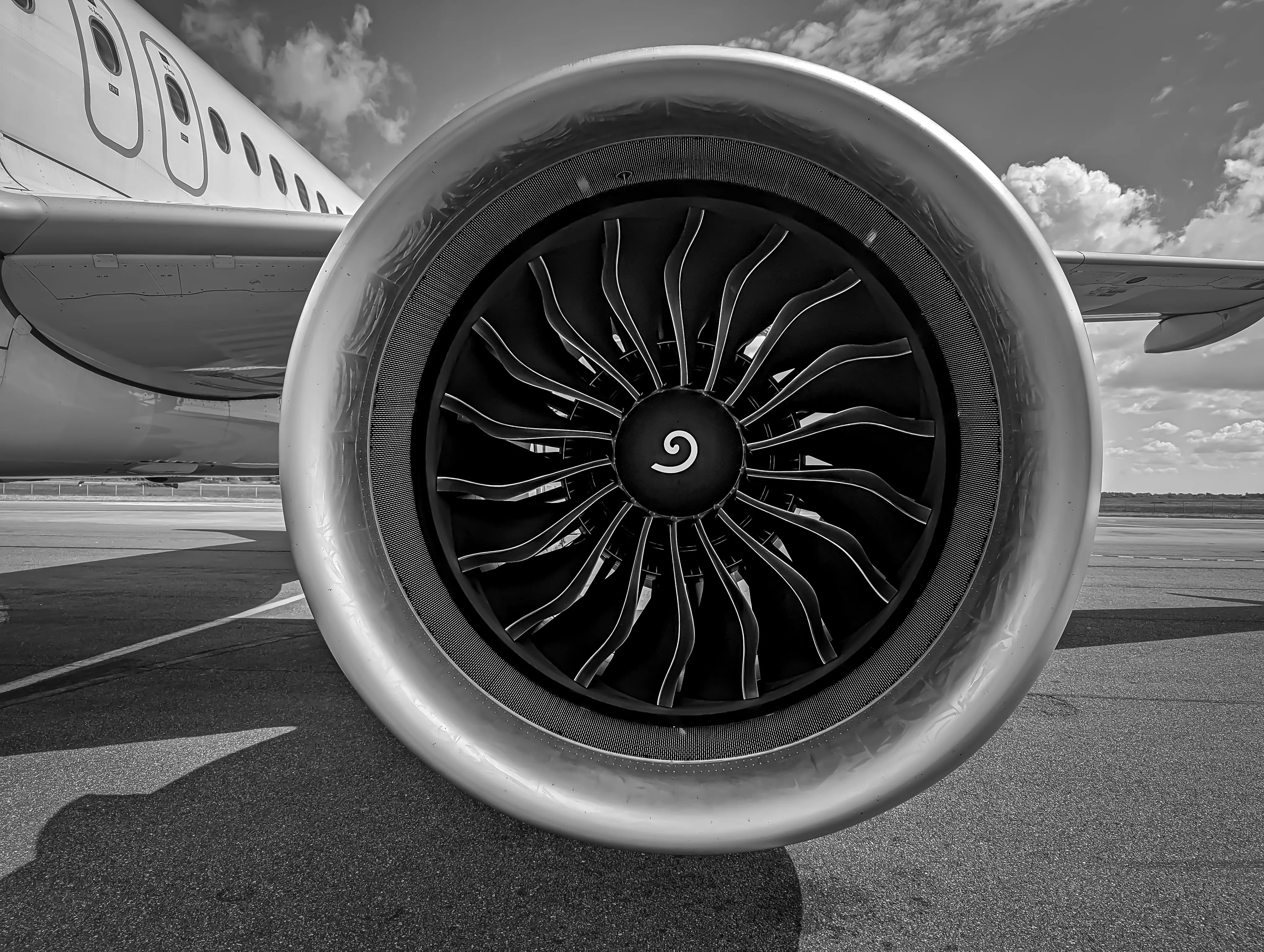 Close Up View Of Airplane Jet Engine On Tarmac · Free