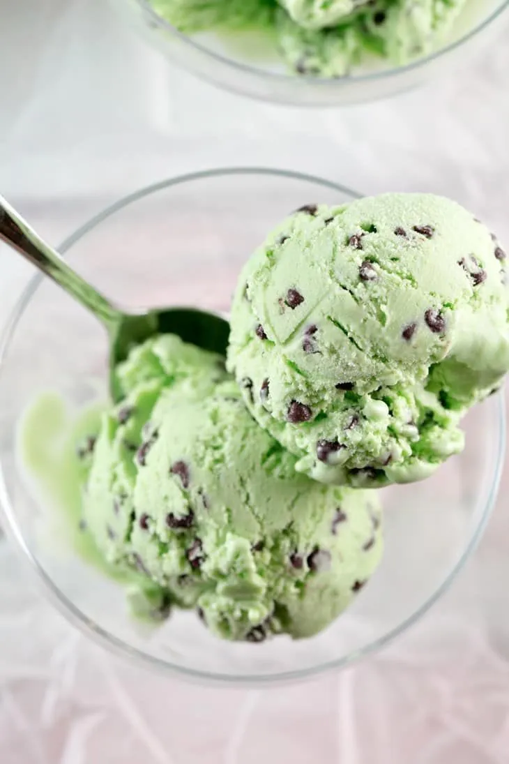 Refreshing Mint Ice Cream with Chocolate Chips. Mint chocolate chip ice cream wallpaper, Mint green ice cream, Mint chocolate chip ice cream background